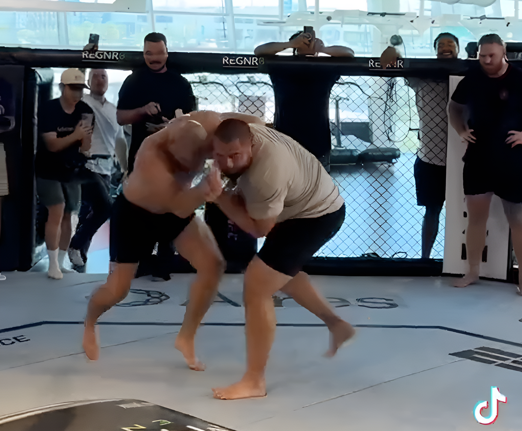 Cincinnati Bengals rookie Dylan Fairchild (right) squares off against UFC MMA fighter Sean Strickland (left)