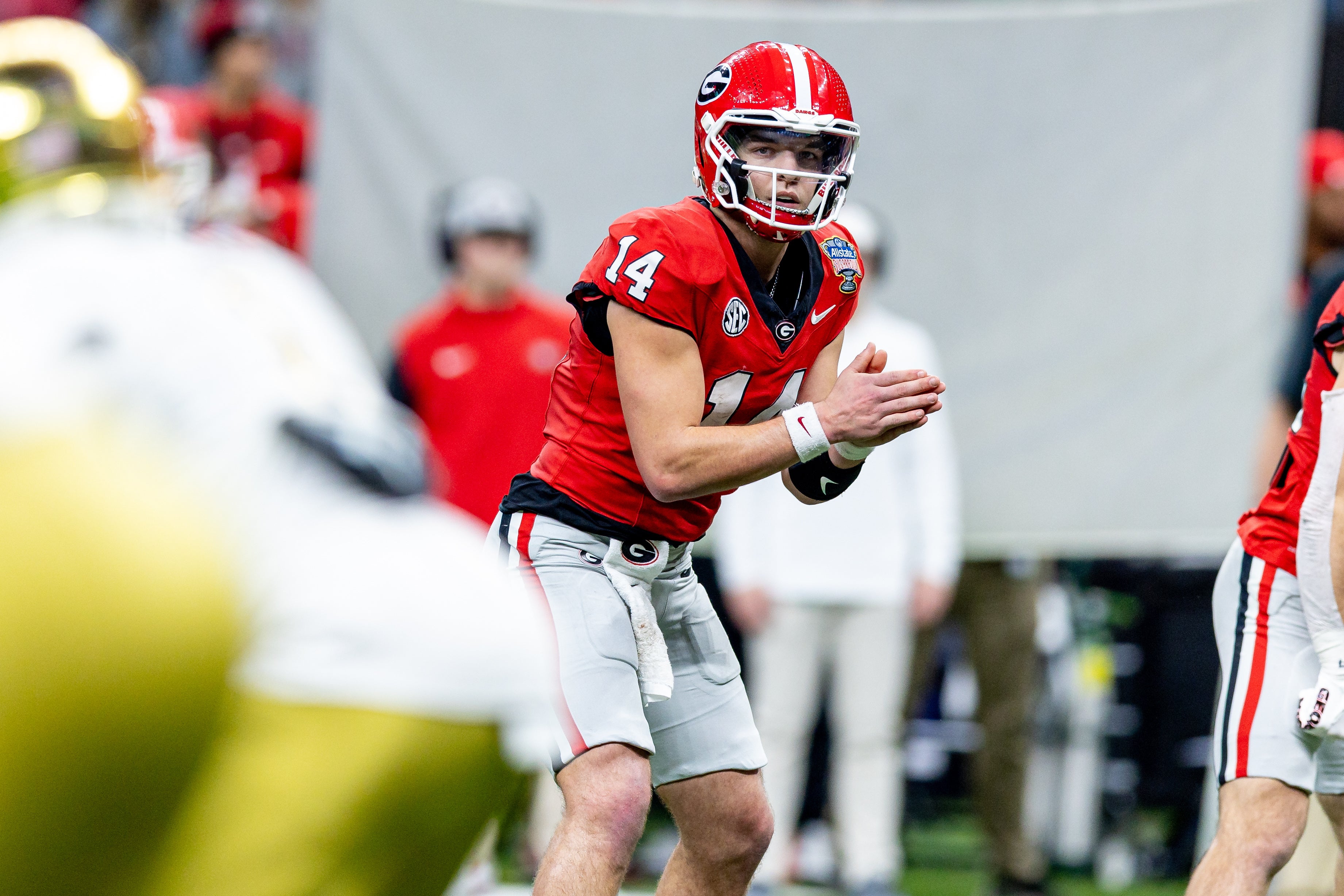 Georgia Bulldogs quarterback Gunner Stockton (14) looks on against the Notre Dame Fighting Irish during the second half at Caesars Superdome.