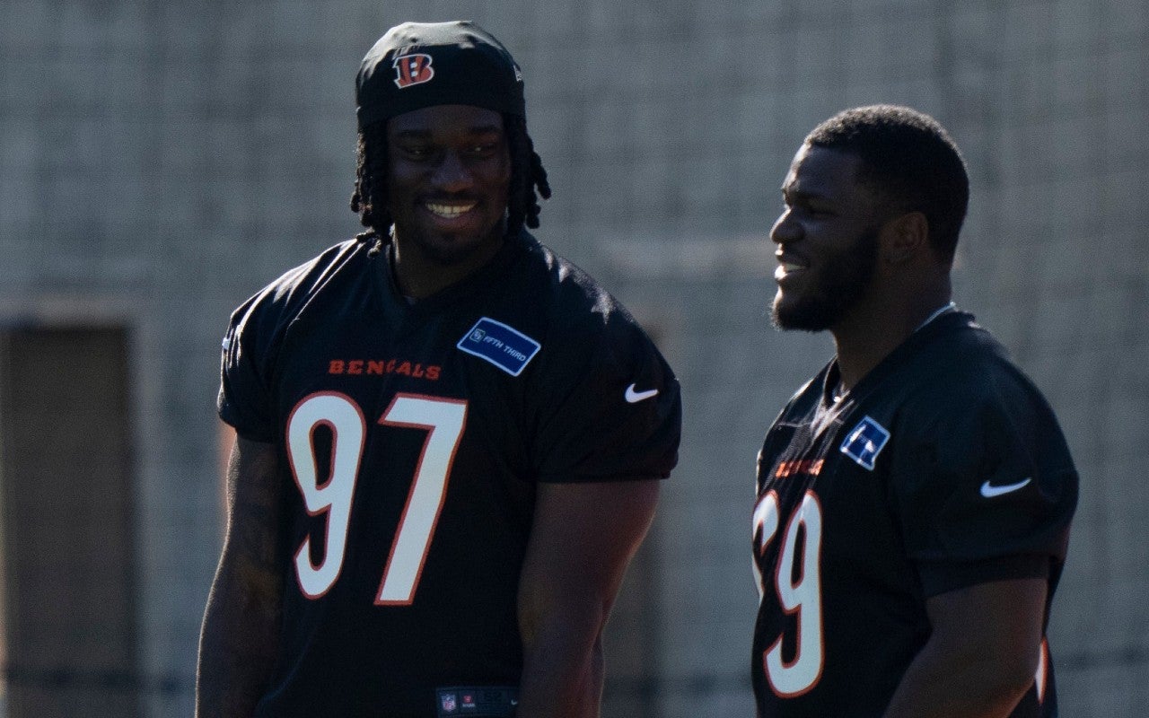 Bengals defensive end Shemar Stewart, left, smiles with Bengals defensive tackle Dante Barnett during the Bengals Rookie Mini Camp on Friday, May 9, 2025 at Paycor Stadium in Cincinnati.