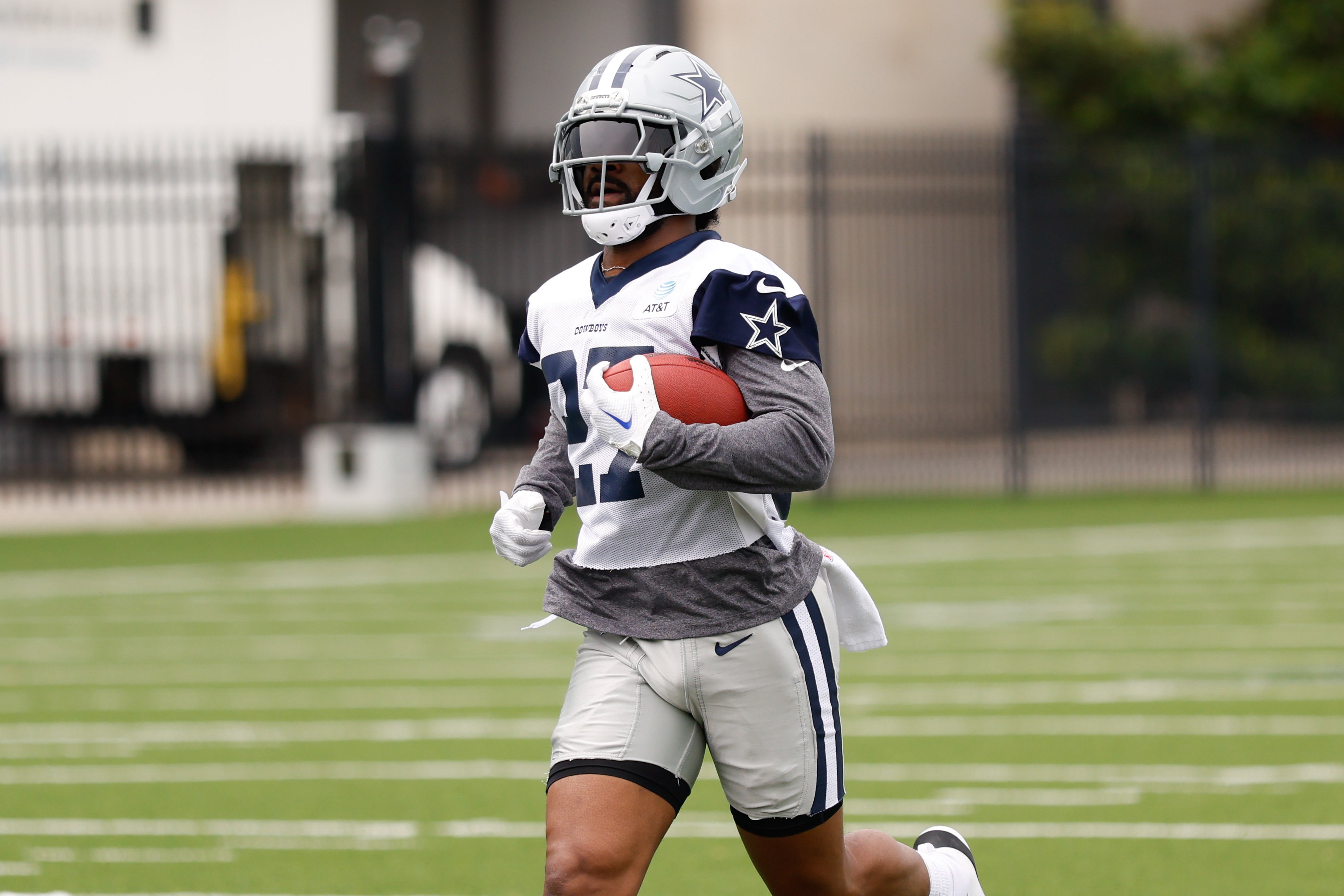 Dallas Cowboys running back Miles Sanders (27) goes through a drill during practice at the Ford Center at the Star Training Facility in Frisco, Texas.