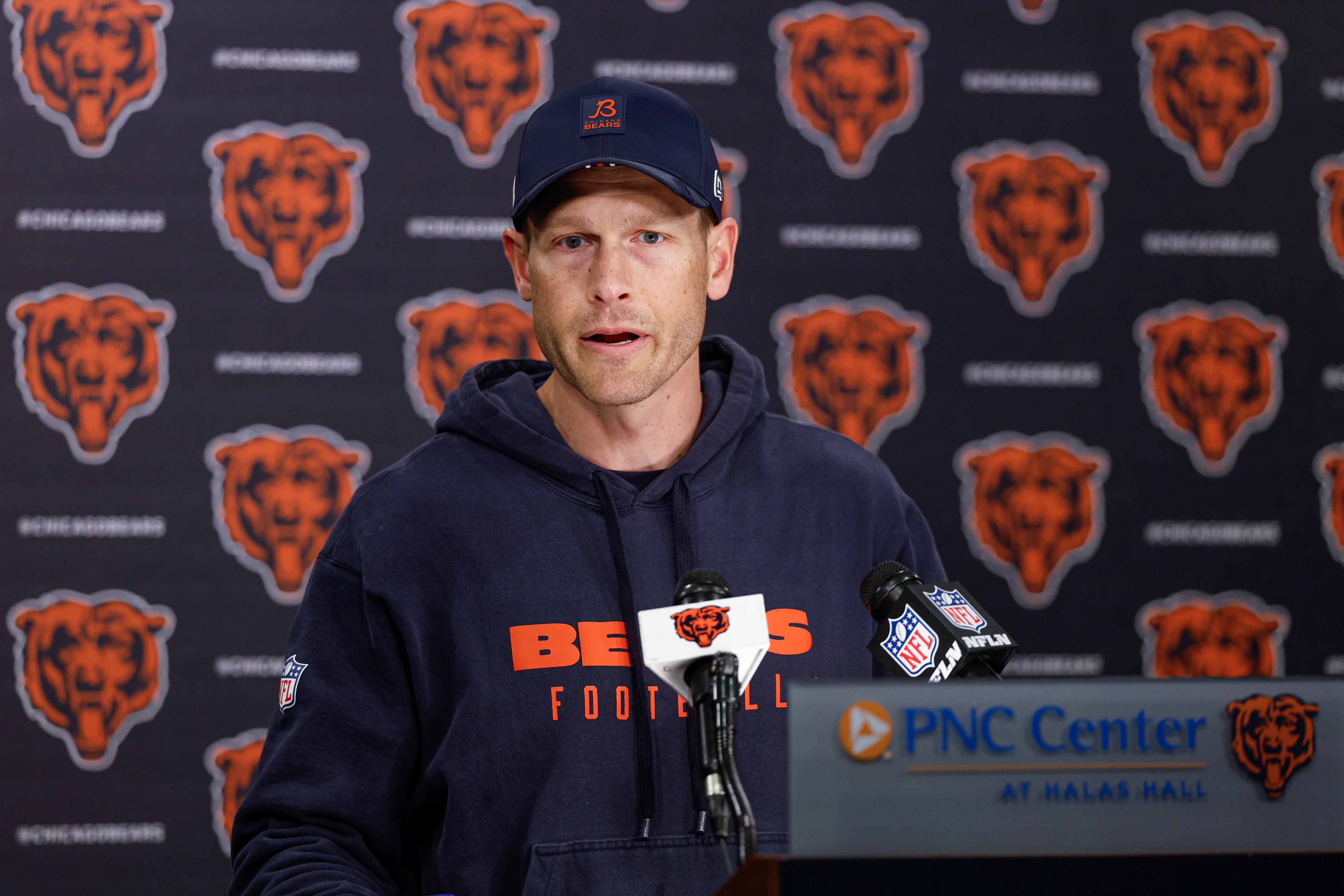 May 9, 2025; Lake Forest, IL, USA; Chicago Bears head coach Ben Johnson (R) speaks during the Rookie Minicamp at Halas Hall.