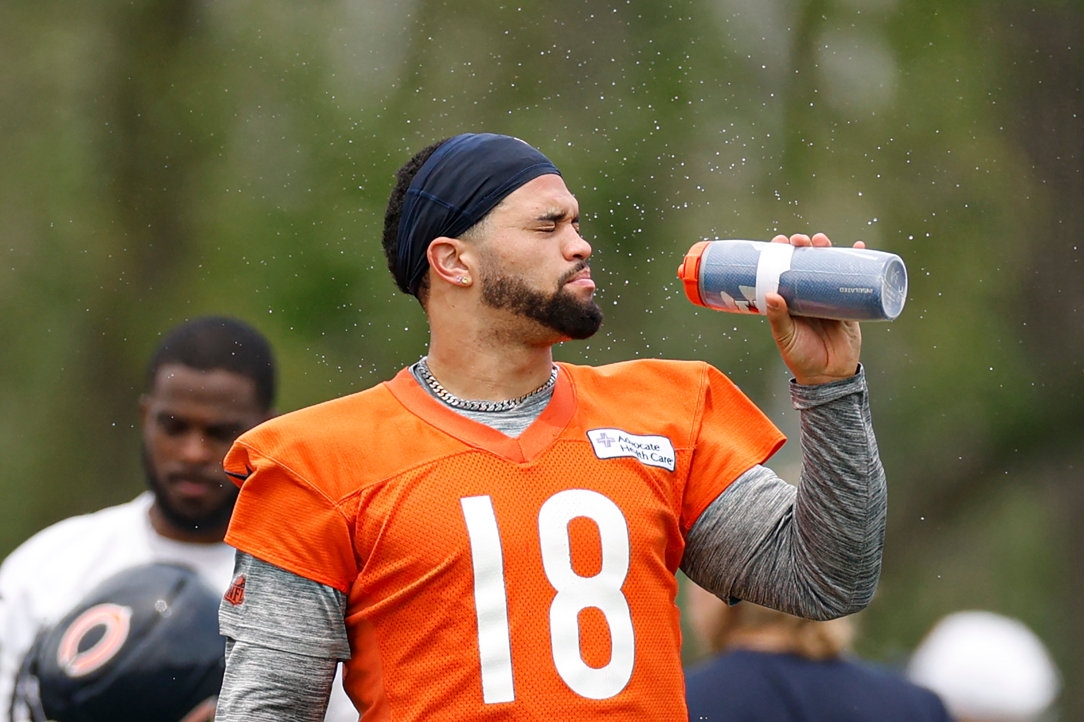 Jun 3, 2025; Lake Forest, IL, USA; Chicago Bears quarterback Caleb Williams (18) cools off during minicamp at Halas Hall.