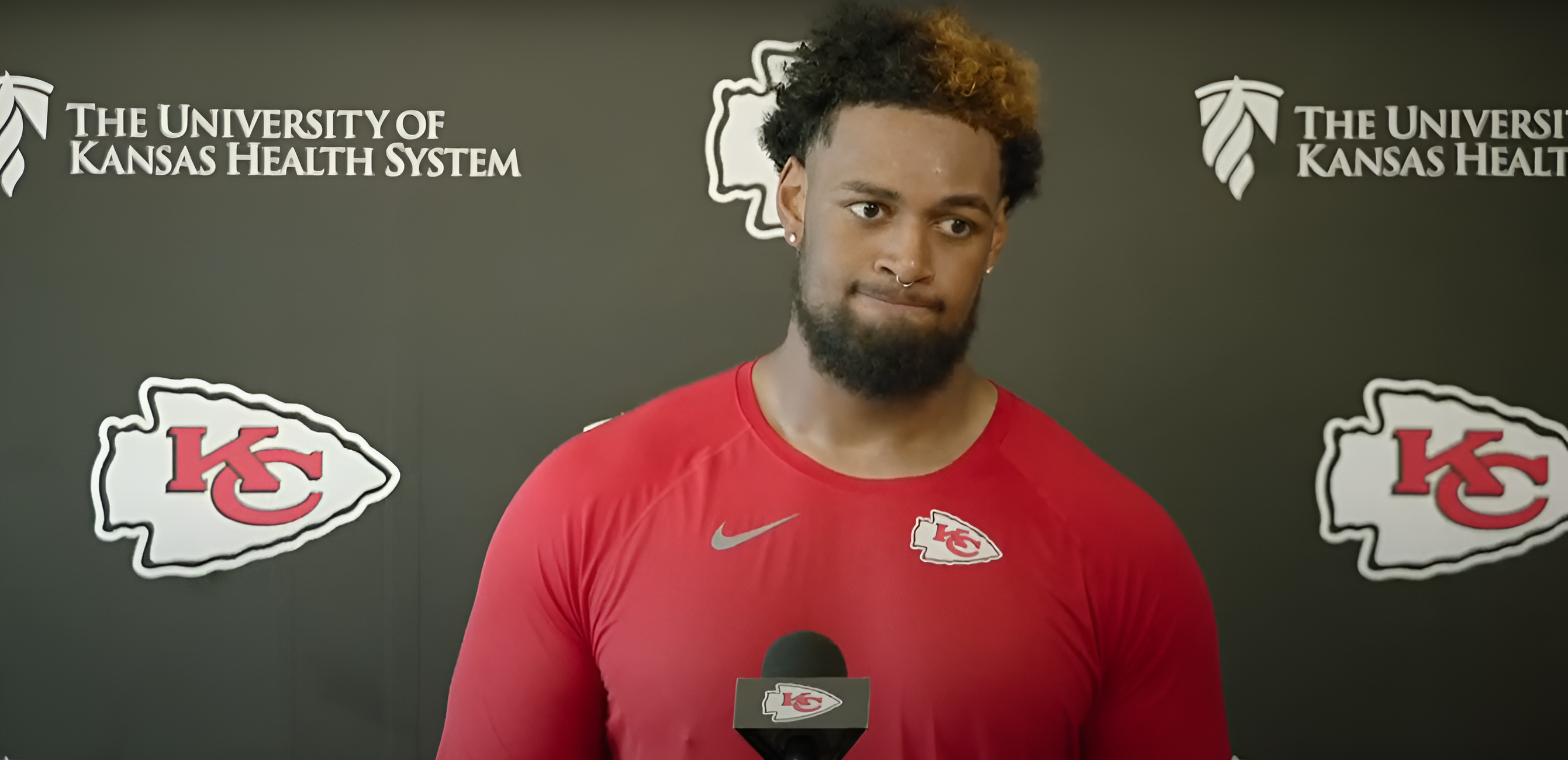Chiefs rookie OT Josh Simmons addresses media members at mandatory minicamp on June 17.