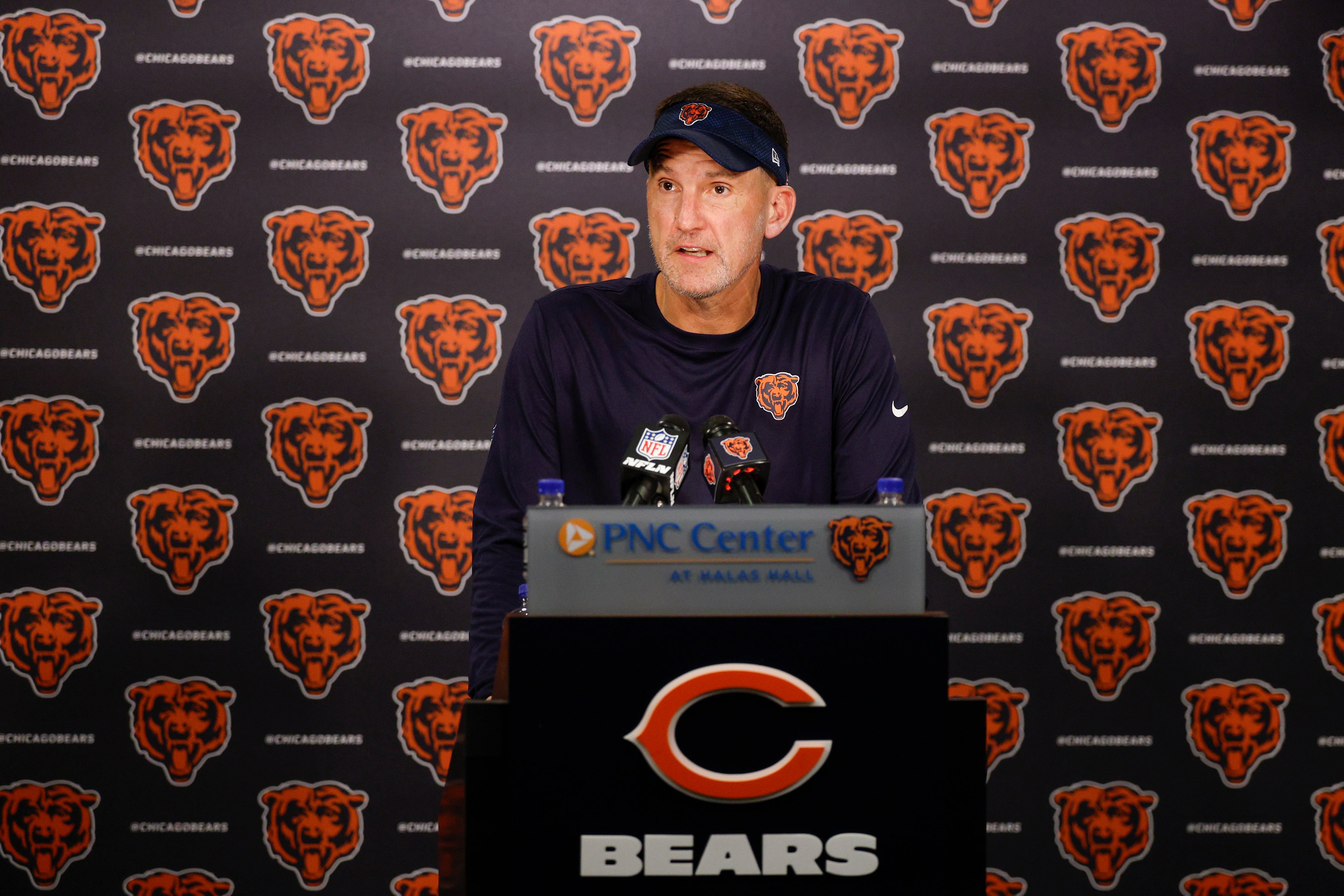 Chicago Bears defensive coordinator Dennis Allen speaks during training camp at Halas Hall.