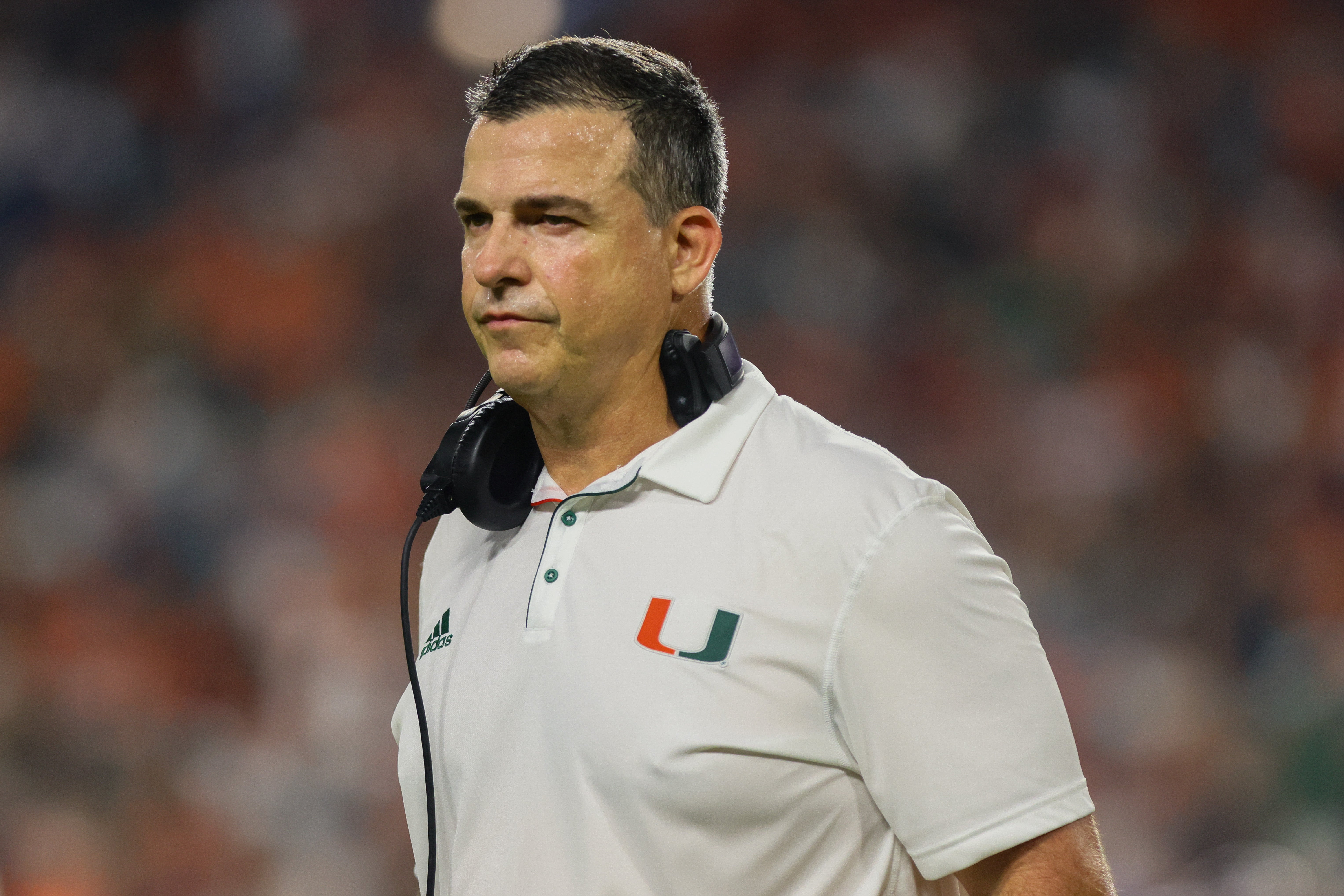 Sep 27, 2024; Miami Gardens, Florida, USA; Miami Hurricanes head coach Mario Cristobal looks on from the sideline against the Virginia Tech Hokies during the third quarter at Hard Rock Stadium.