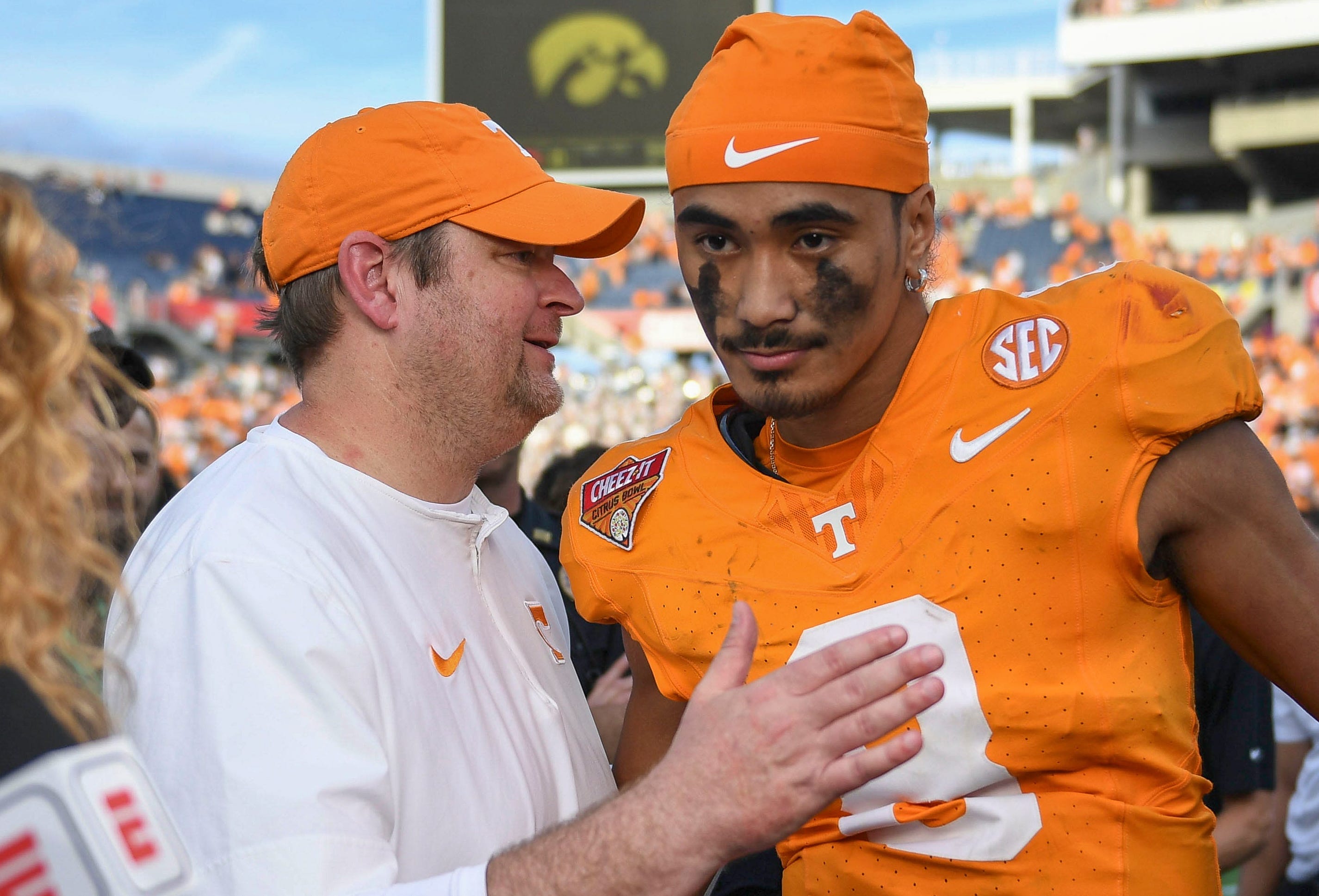 Tennessee head coach Josh Heupel turns to quarterback Nico Iamaleava (8) after their post game interview after winning the Citrus Bowl NCAA College football game on Monday, January 1, 2024 in Orlando, Fla. against Iowa.
