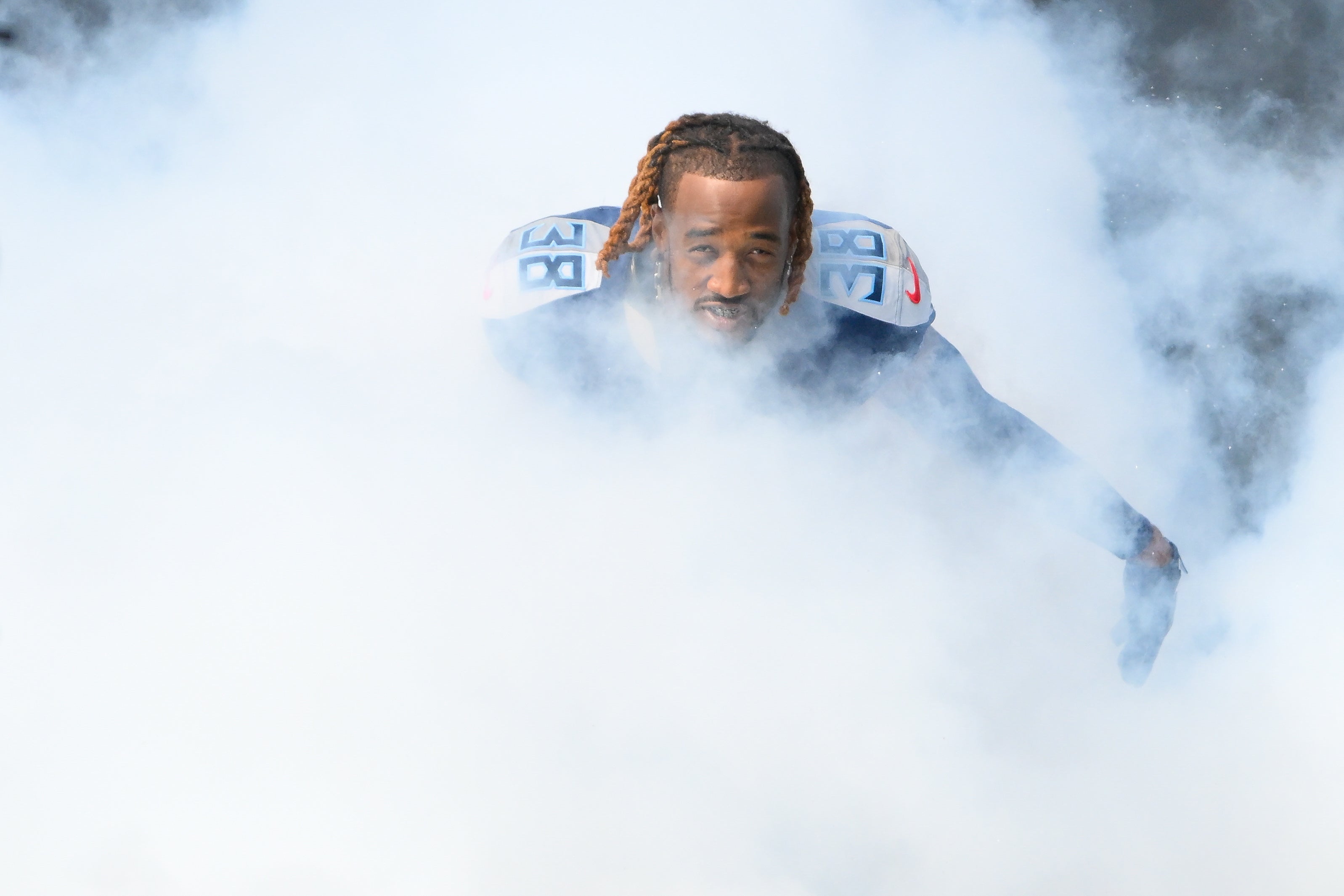Oct 13, 2024; Nashville, Tennessee, USA; Tennessee Titans cornerback L'Jarius Sneed (38) runs out during player introductions against the Indianapolis Colts at Nissan Stadium. Mandatory Credit: Steve Roberts-Imagn Images