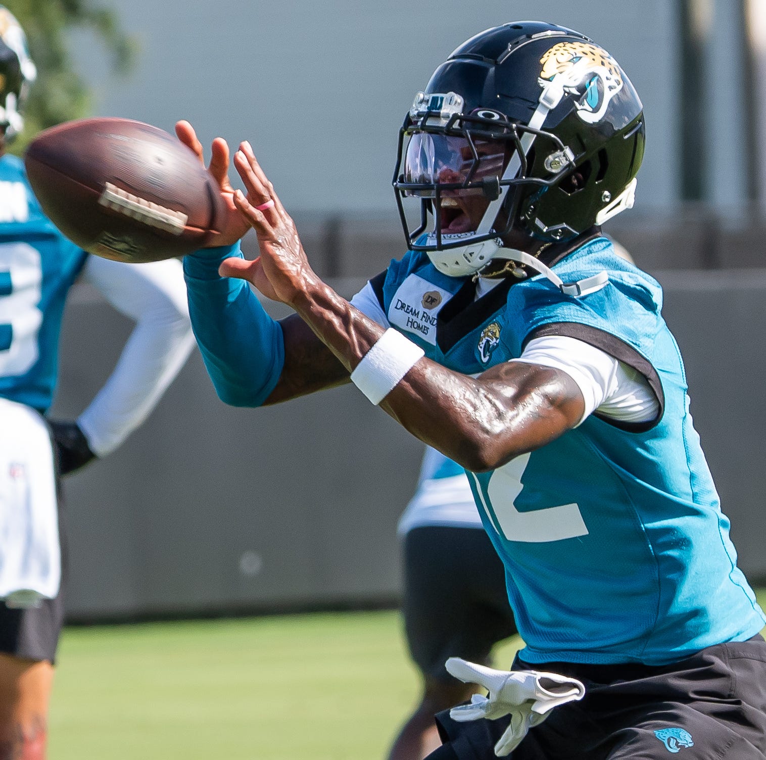 Jacksonville Jaguars wide receiver Travis Hunter (12) runs a passing drill during the Jacksonville Jaguars’ third mandatory minicamp Thursday June 12, 2025 at the Miller Electric Center in Jacksonville, Fla.