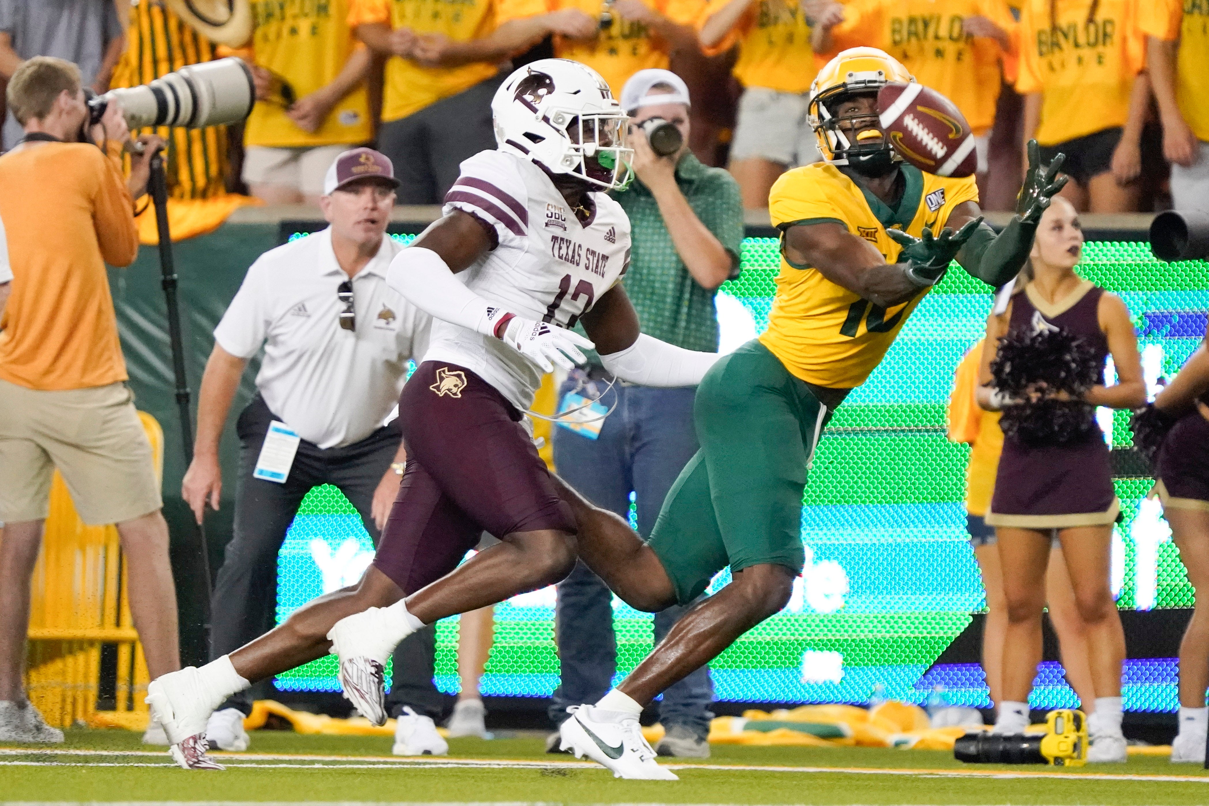 Baylor Bears wide receiver Hal Presley (16) makes the catch in front of Texas State Bobcats safety Tory Spears (12) during the second half at McLane Stadium.