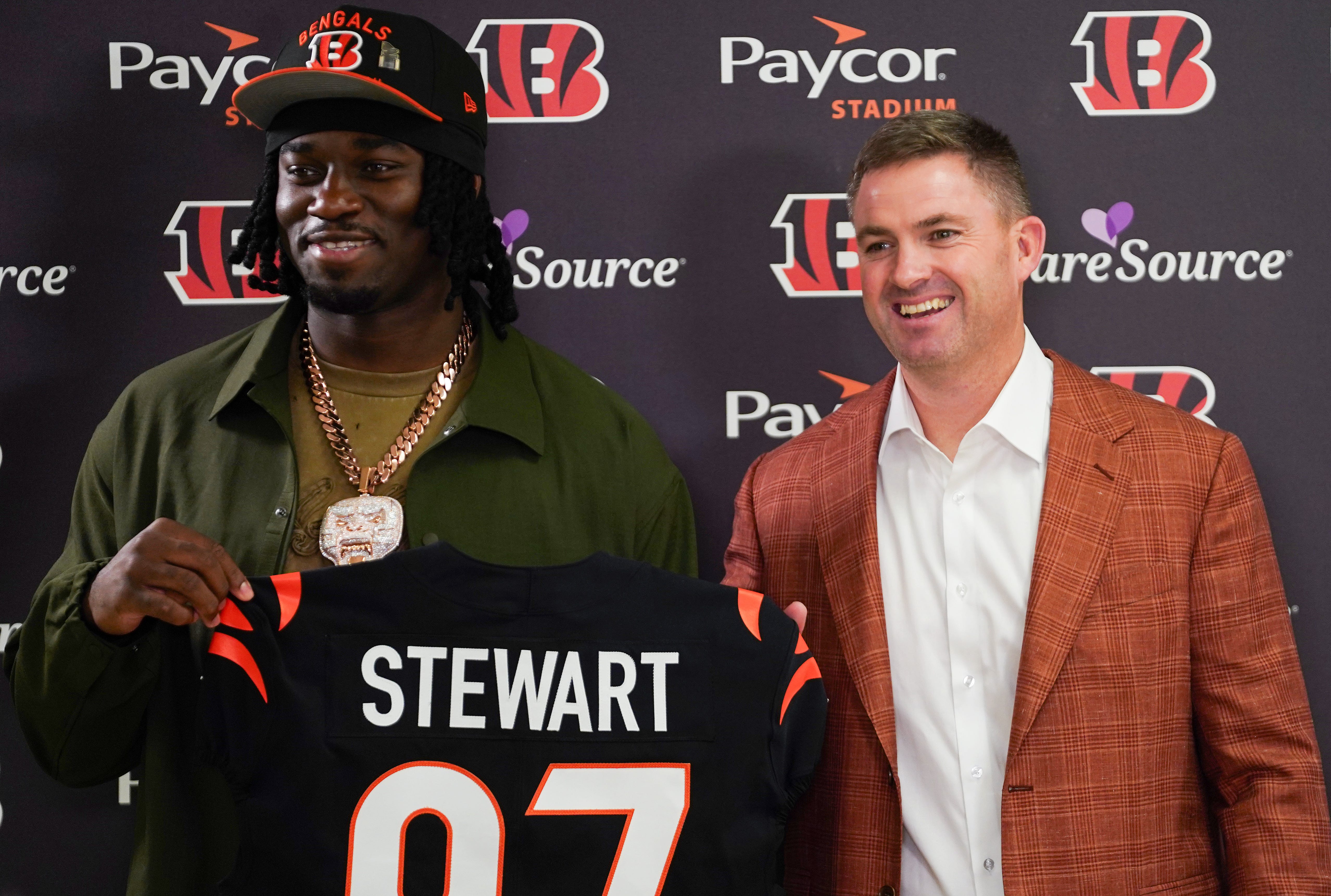 Cincinnati Bengals first-round draft pick Shemar Stewart, left, and head coach Zac Taylor, right, pose together ahead of a press conference, Friday, April 25, 2025, at Paycor Stadium in Downtown Cincinnati.