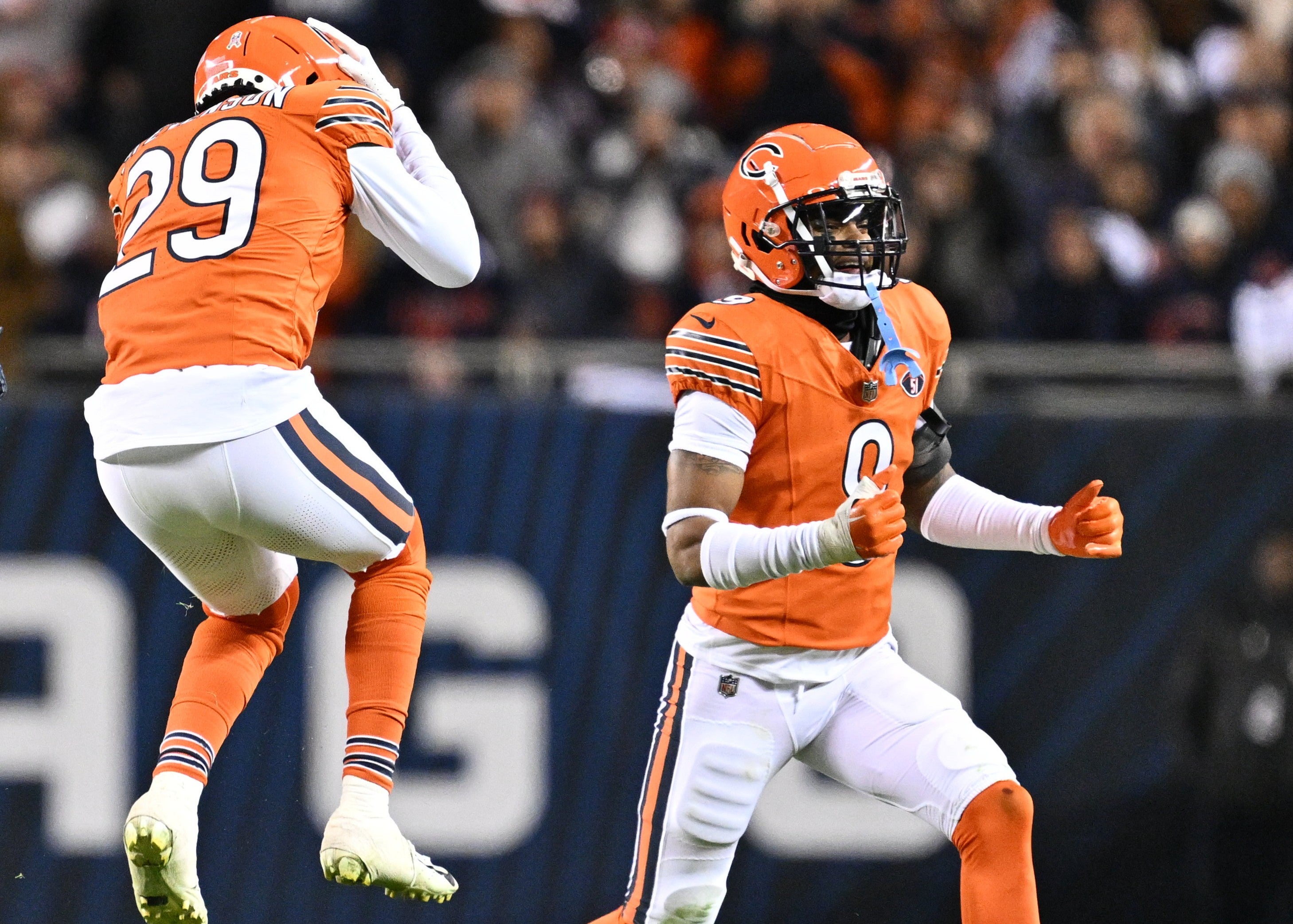 Chicago Bears Tyrique Stevenson (29) and Jaquan Brisker (9) react after a play in the first half against the Carolina Panthers at Soldier Field.