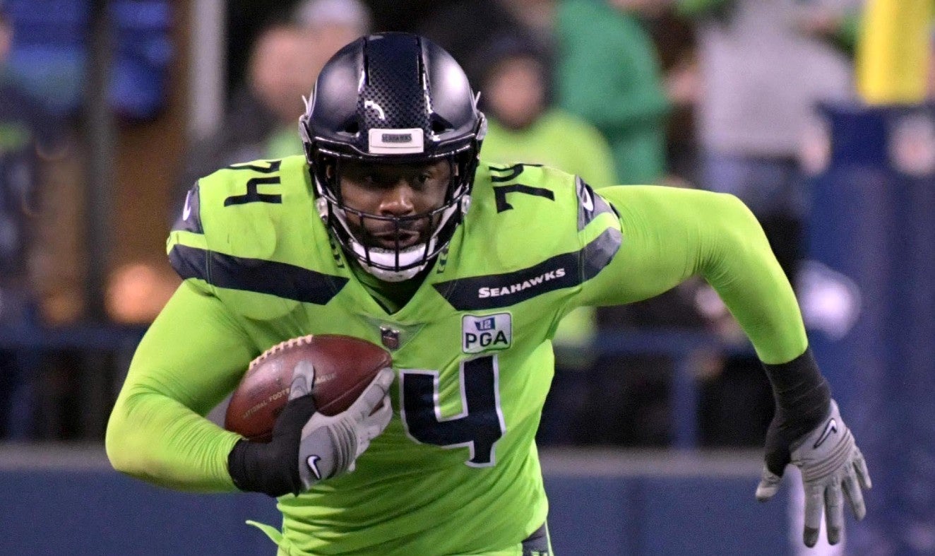 Dec 10, 2018; Seattle, WA, USA; Seattle Seahawks offensive tackle George Fant (74) carries the ball on a pass reception in the third quarter against the Minnesota Vikings at CenturyLink Field. The Seahawks defeated the Vikings 21-7.