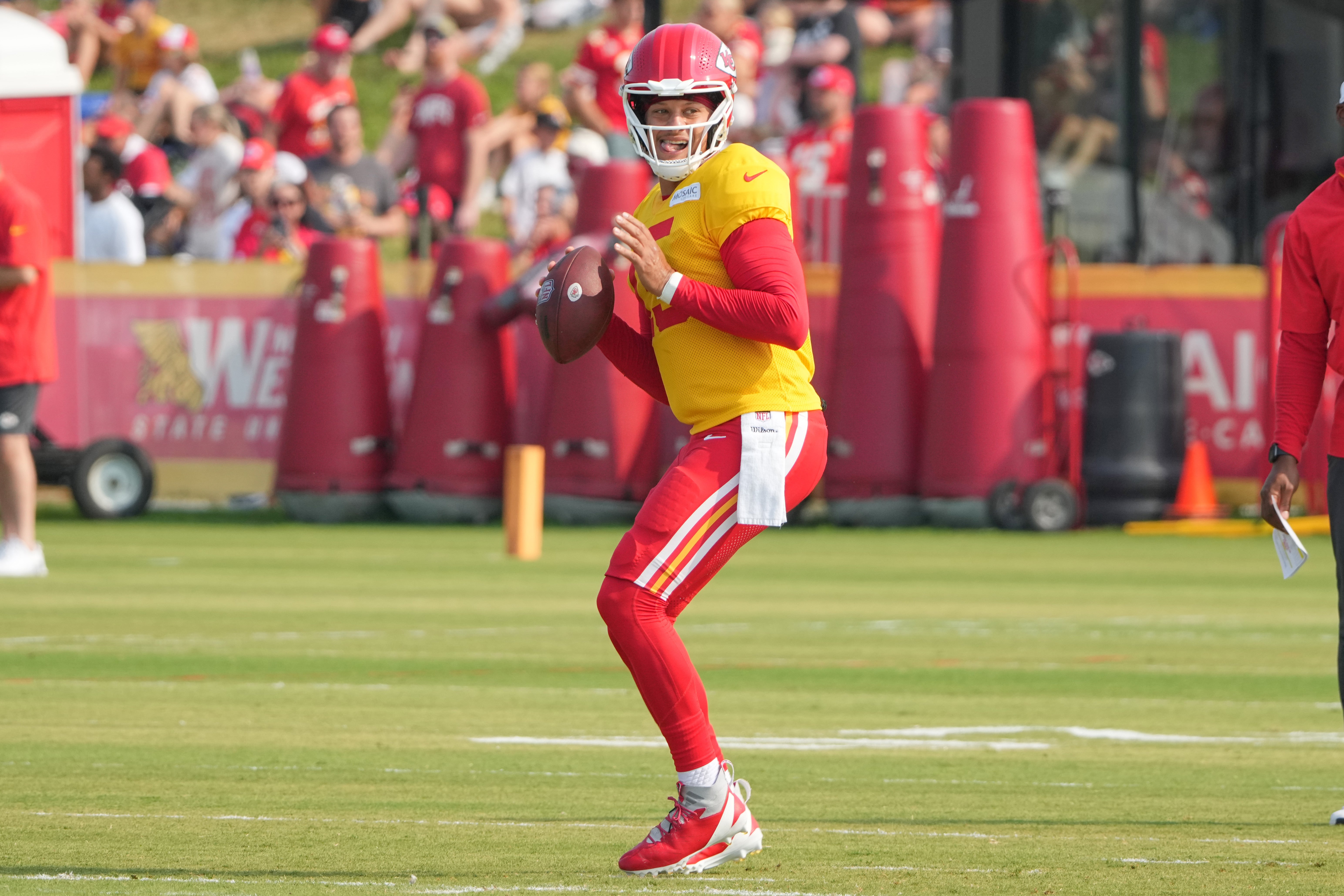 Kansas City Chiefs quarterback Patrick Mahomes (15) drops back to pass during training camp at Missouri Western State University.
