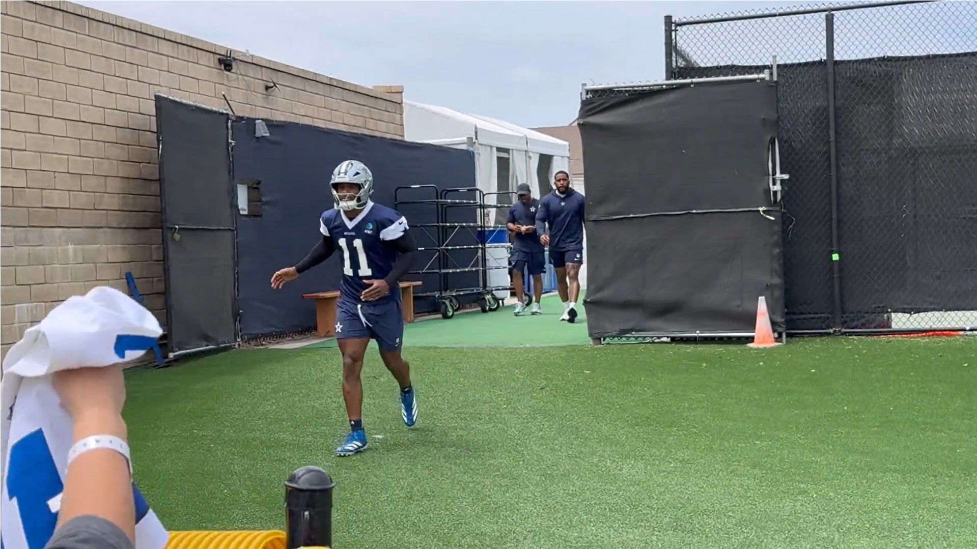 Dallas Cowboys EDGE Micah Parsons takes the field for training camp.