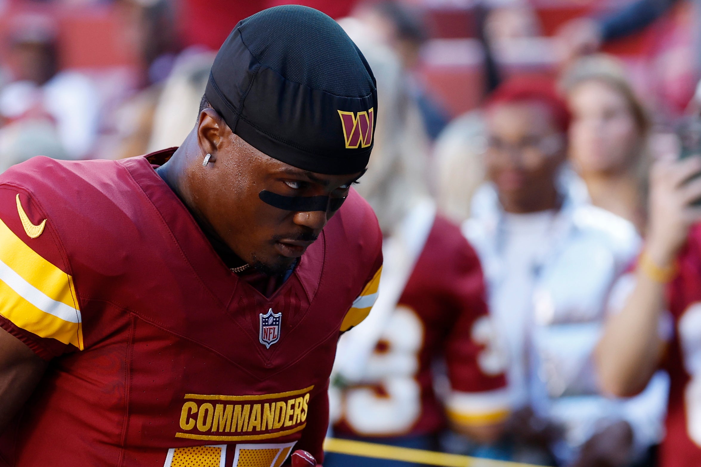 Oct 20, 2024; Landover, Maryland, USA; Washington Commanders wide receiver Terry McLaurin (17) walks off the field after warmup prior to the game against the Carolina Panthers, toppic at Northwest Stadium.