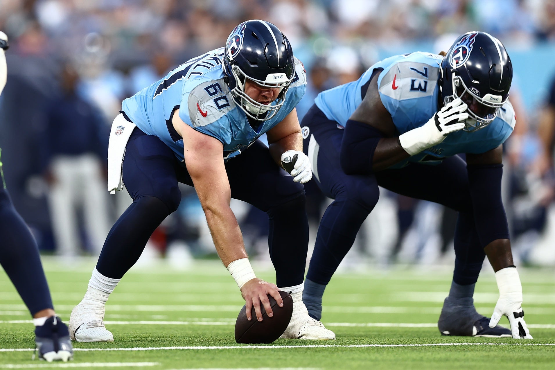 Tennessee Titans offensive tackle Daniel Brunskill (60) and offensive tackle Lachavious Simmons (73) set up for a play in the second quarter against the Seattle Seahawks at Nissan Stadium.