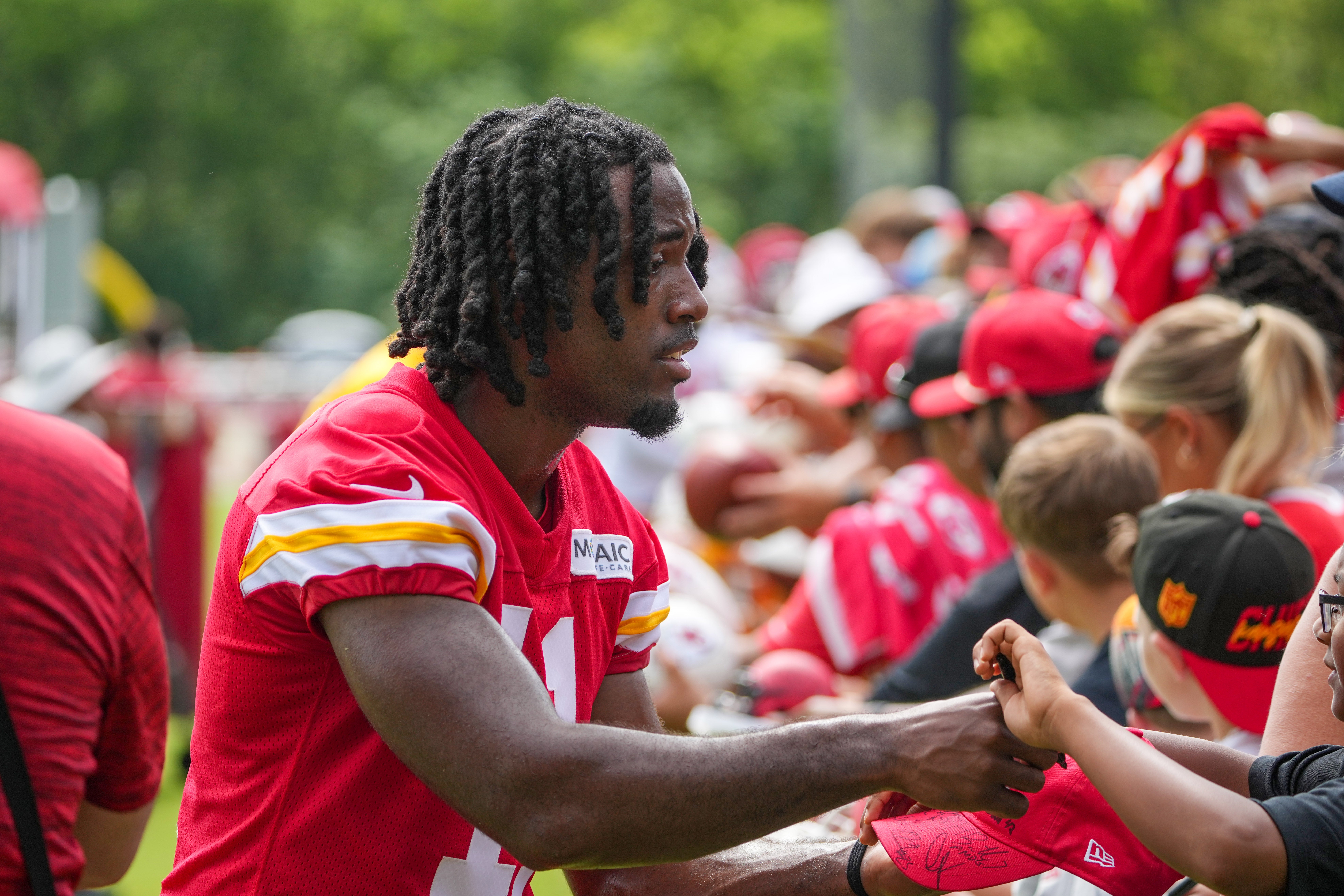 Jul 22, 2025; St. Joseph, MO, USA; Kansas City Chiefs wide receiver Jalen Royals (11) signs autographs for fans after training camp at Missouri Western State University.