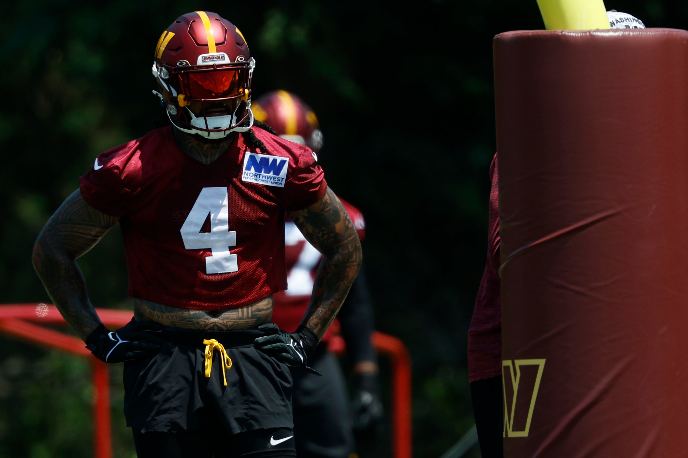 Jun 10, 2025; Ashburn, VA, USA; Washington Commanders linebacker Frankie Luvu (4) stands on the field during drills on day one of minicamp at Commanders Park.