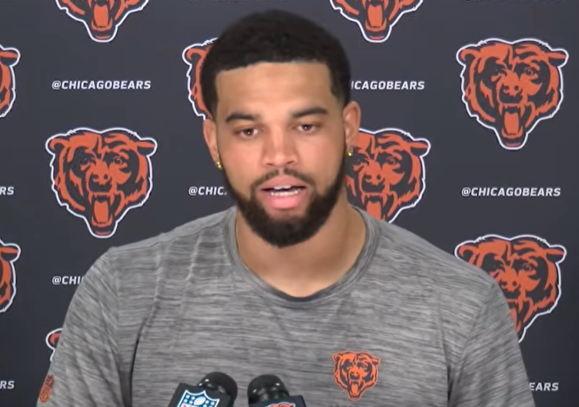 Caleb Williams speaks with reporters prior to the start of training camp.