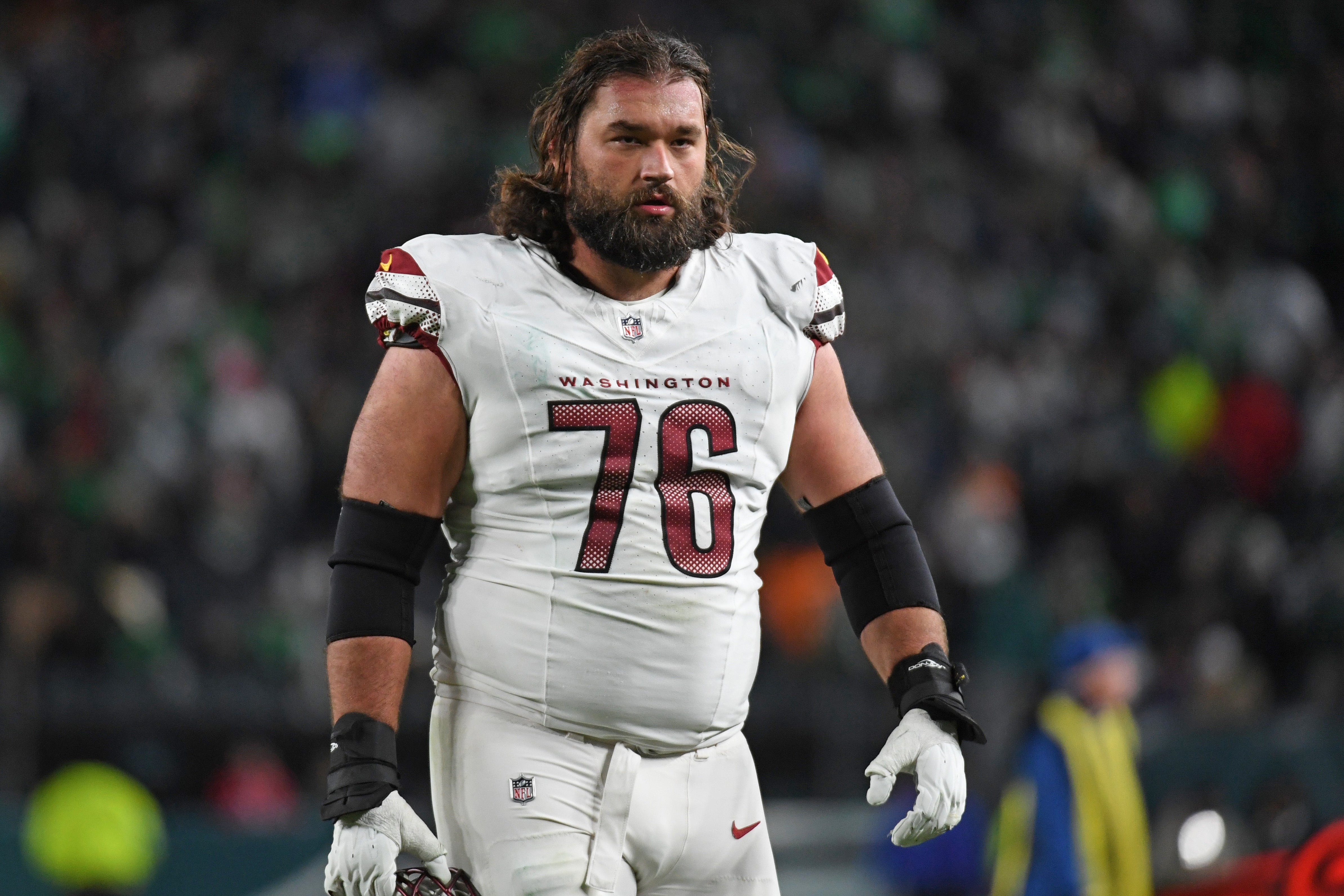 Nov 14, 2024; Philadelphia, Pennsylvania, USA; Washington Commanders guard Sam Cosmi (76) against the Philadelphia Eagles at Lincoln Financial Field. 
