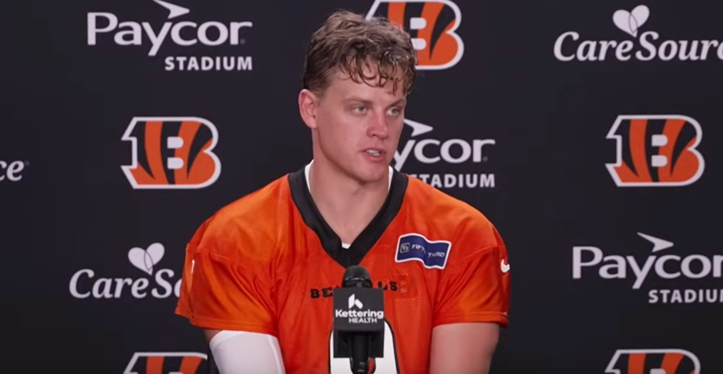 Cincinnati Bengals quarterback Joe Burrow speaks to local media members following a training camp practice on July 23, 2025.