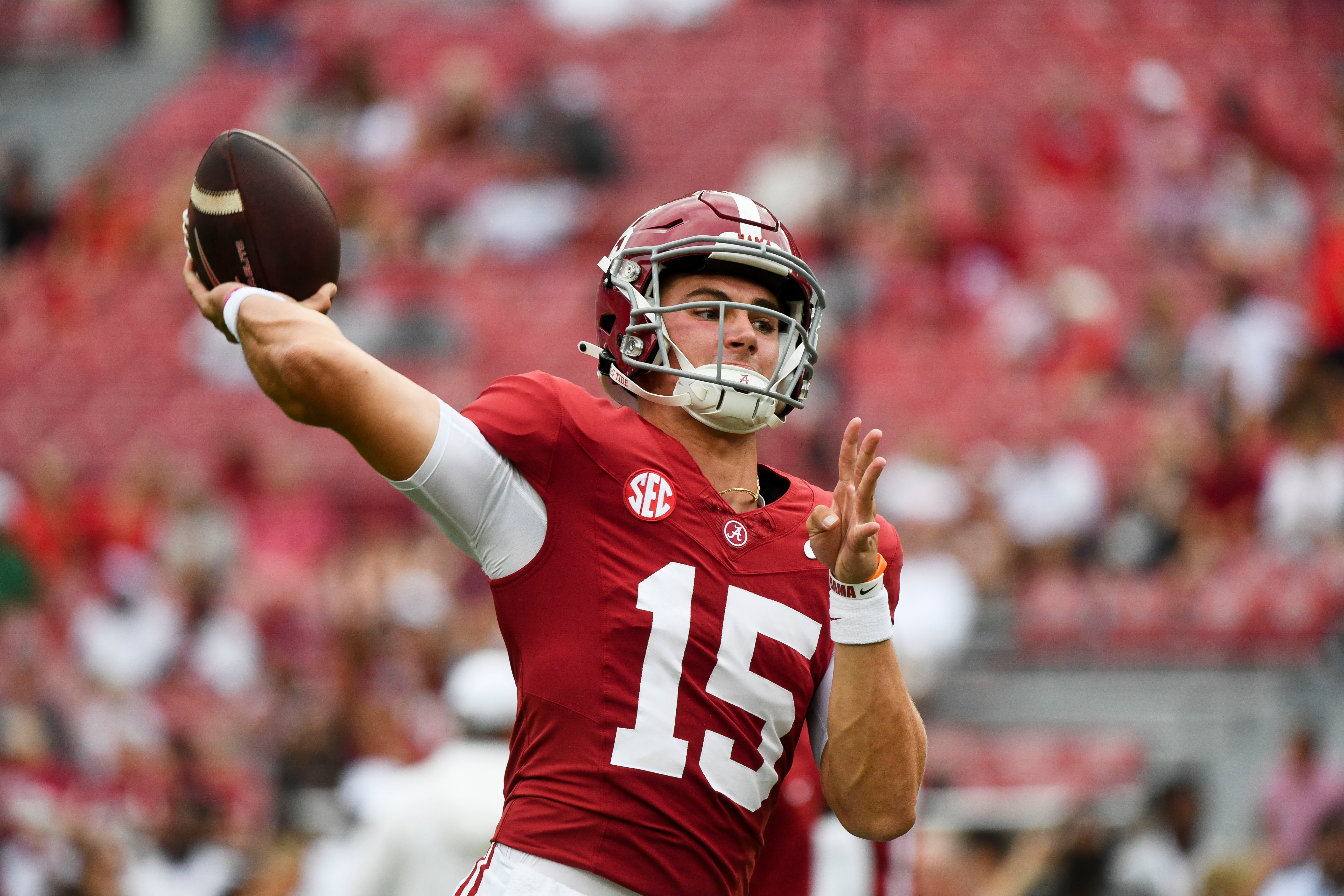 Sep 7, 2024; Tuscaloosa, Alabama, USA; Alabama Crimson Tide quarterback Ty Simpson (15) warms up before a game against the South Florida Bulls at Bryant-Denny Stadium. Mandatory Credit: Gary Cosby Jr.-Imagn Images