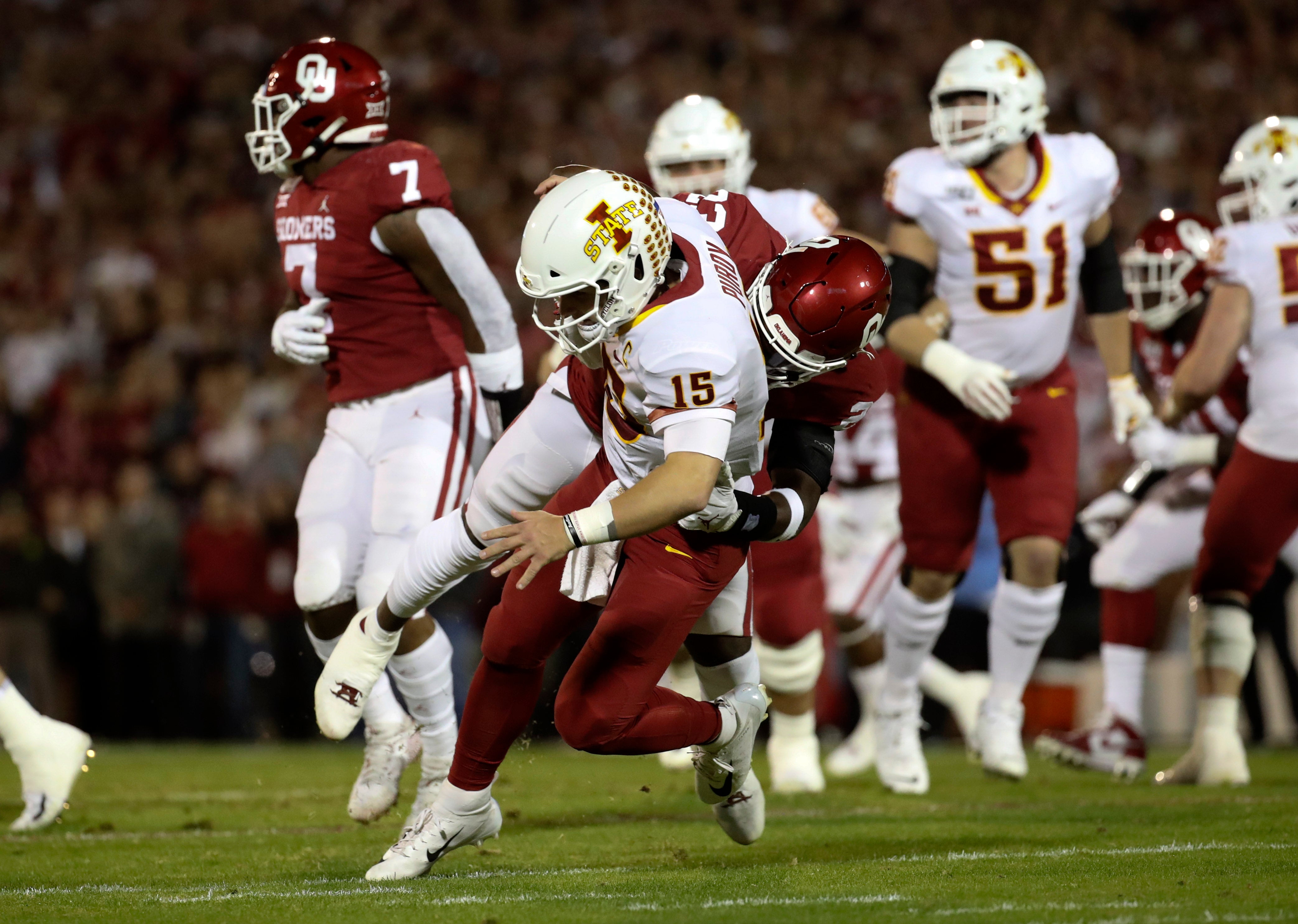 Nov 9, 2019; Norman, OK, USA; Oklahoma Sooners linebacker DaShaun White (23) pressures Iowa State Cyclones quarterback Brock Purdy (15) during the first quarter at Gaylord Family - Oklahoma Memorial Stadium.