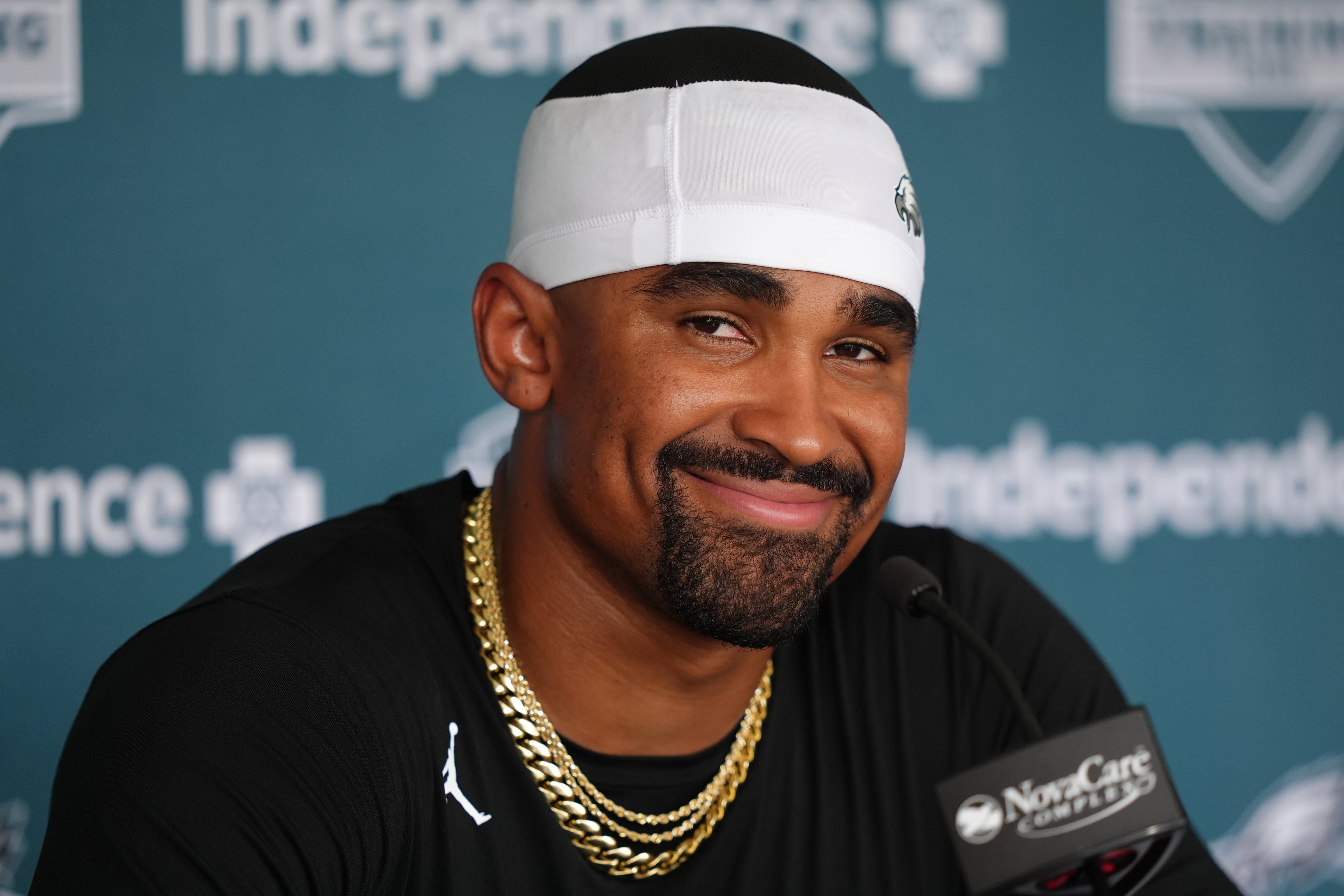 Philadelphia Eagles quarterback Jalen Hurts (1) reacts as he addresses media during training camp at NovaCare Complex.