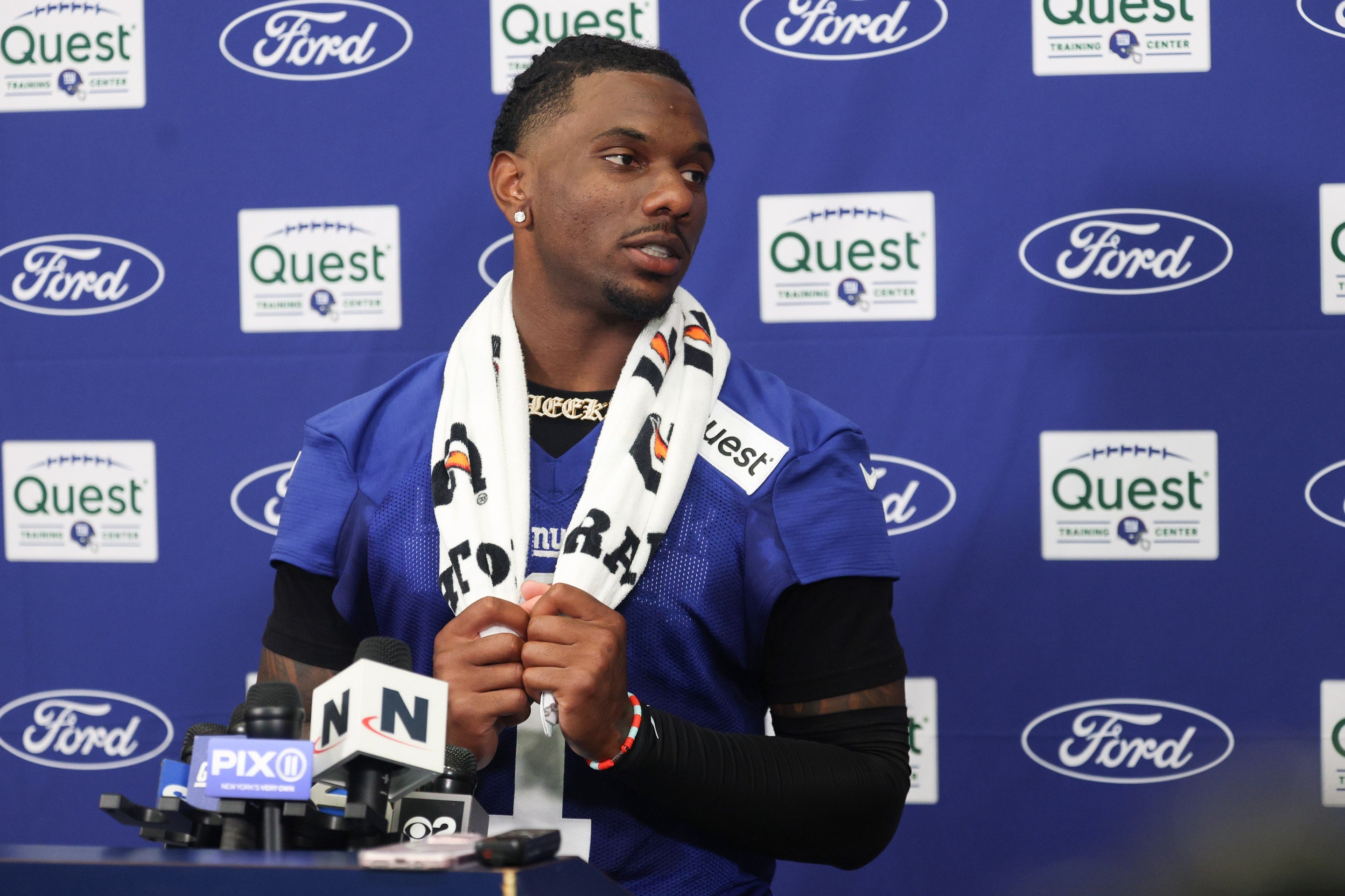 New York Giants wide receiver Malik Nabers (1) talks with media during training camp at Quest Diagnostics Training Center.