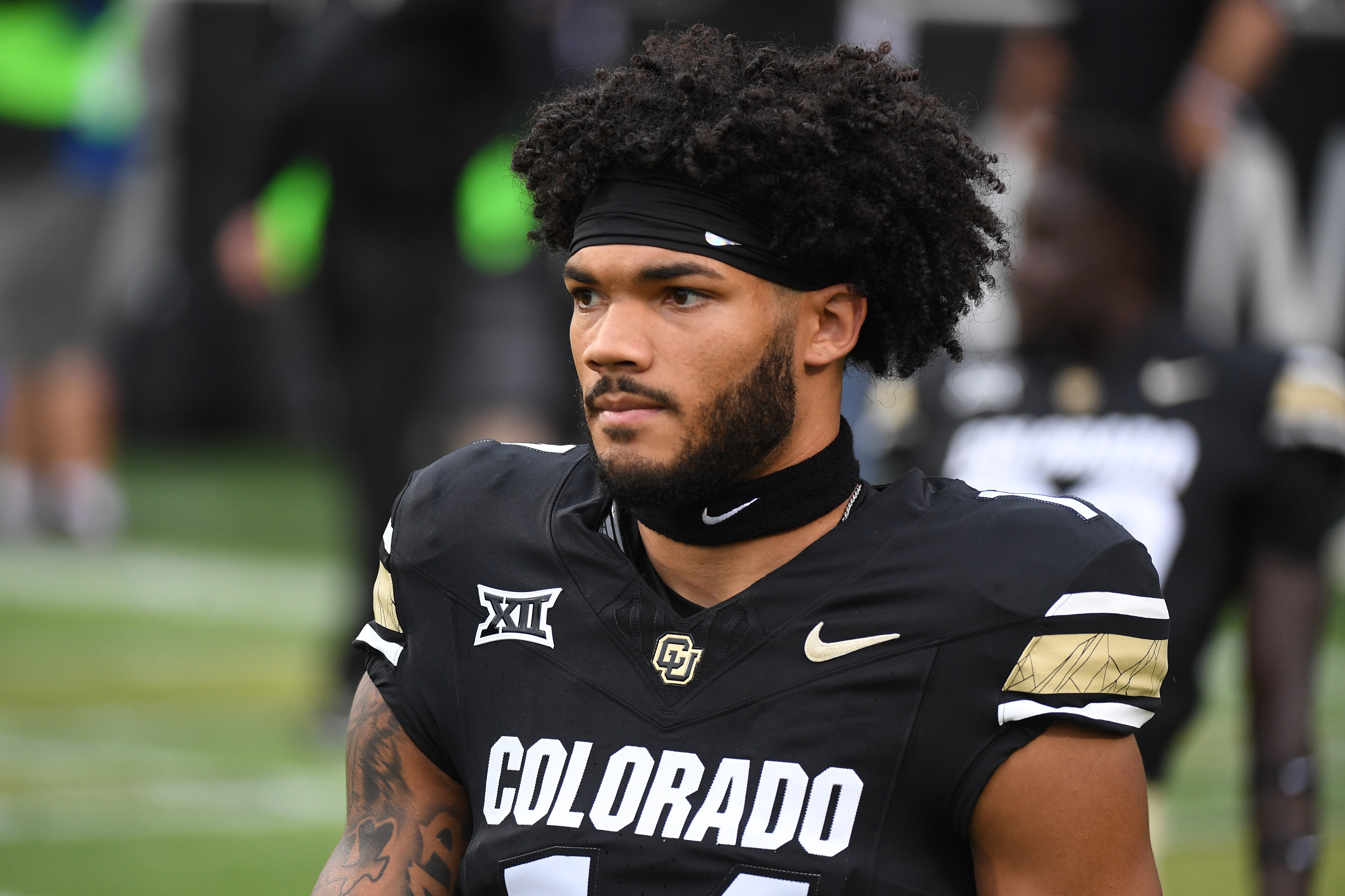 Colorado Buffaloes wide receiver Will Sheppard (14) stretches before the game against the Baylor Bears at Folsom Field.