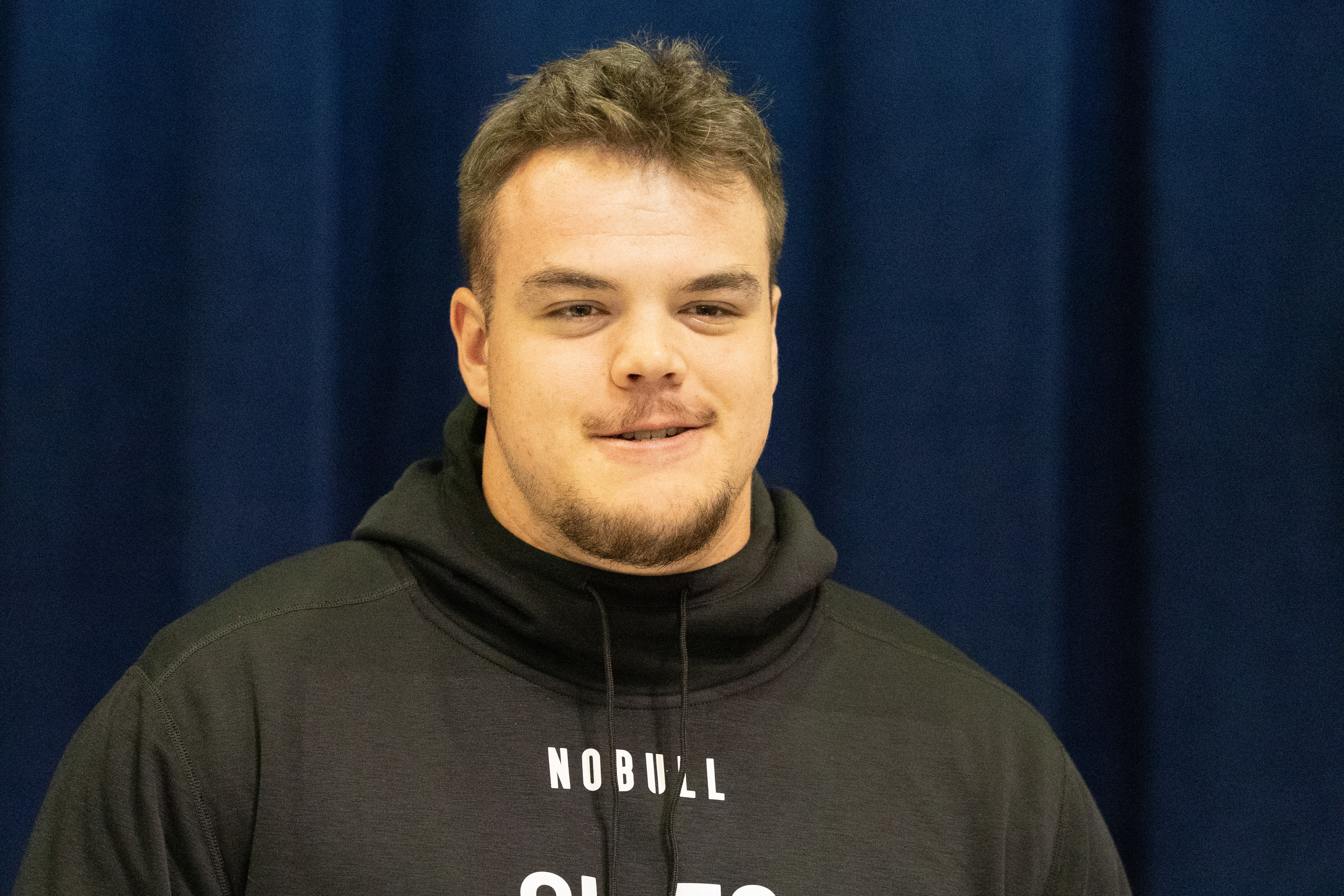 Mar 2, 2024; Indianapolis, IN, USA; South Dakota State offensive lineman Garret Greenfield (OL30) talks to the media during the 2024 NFL Combine at Lucas Oil Stadium.