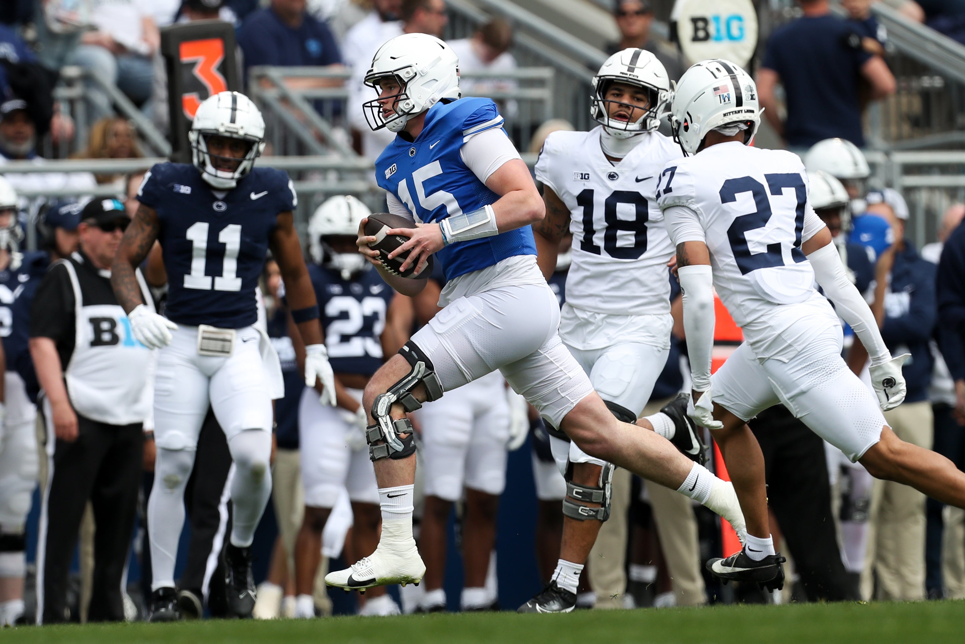 Apr 26, 2025; University Park, PA, USA; Penn State Nittany Lions quarterback Drew Allar (15) runs with ball during the first quarter of the Blue White spring game at Beaver Stadium. The White team defeated the Blue team 10-8. Mandatory Credit: Matthew O'Haren-Imagn Images