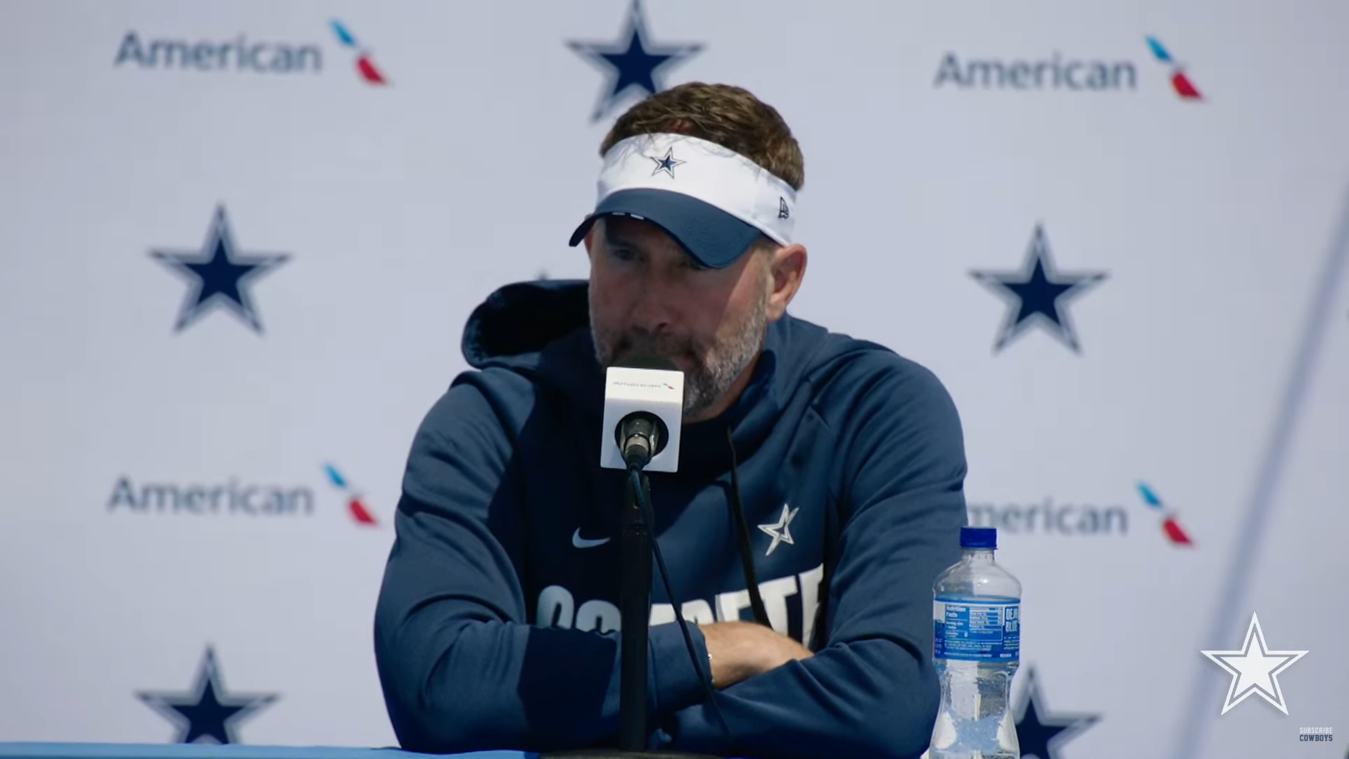 Dallas Cowboys head coach Brian Schottenheimer talks to reporters ahead of team's third training camp practice.