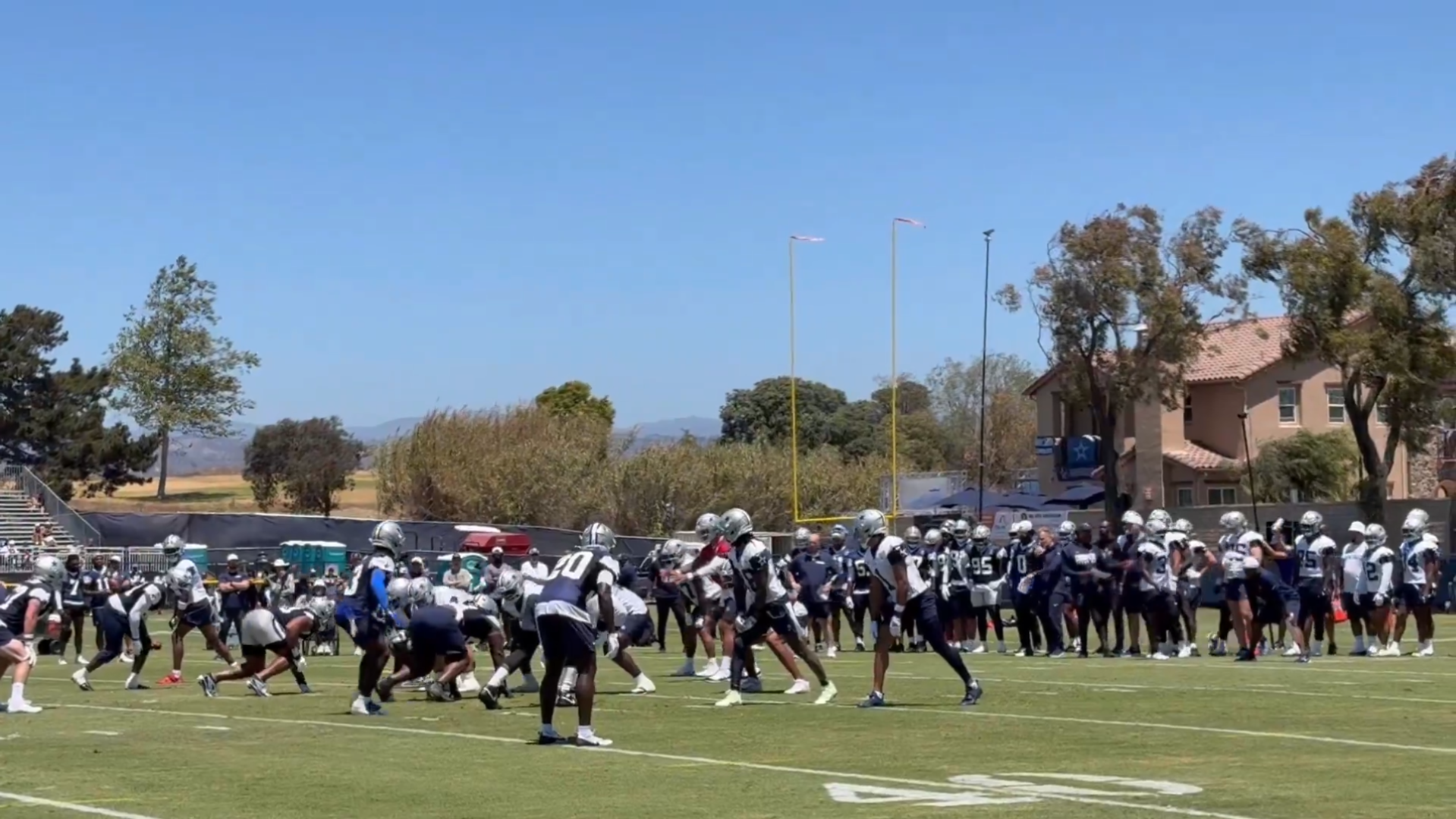 Dallas Cowboys run a read option play with Dak Prescott at quarterback during training camp.
