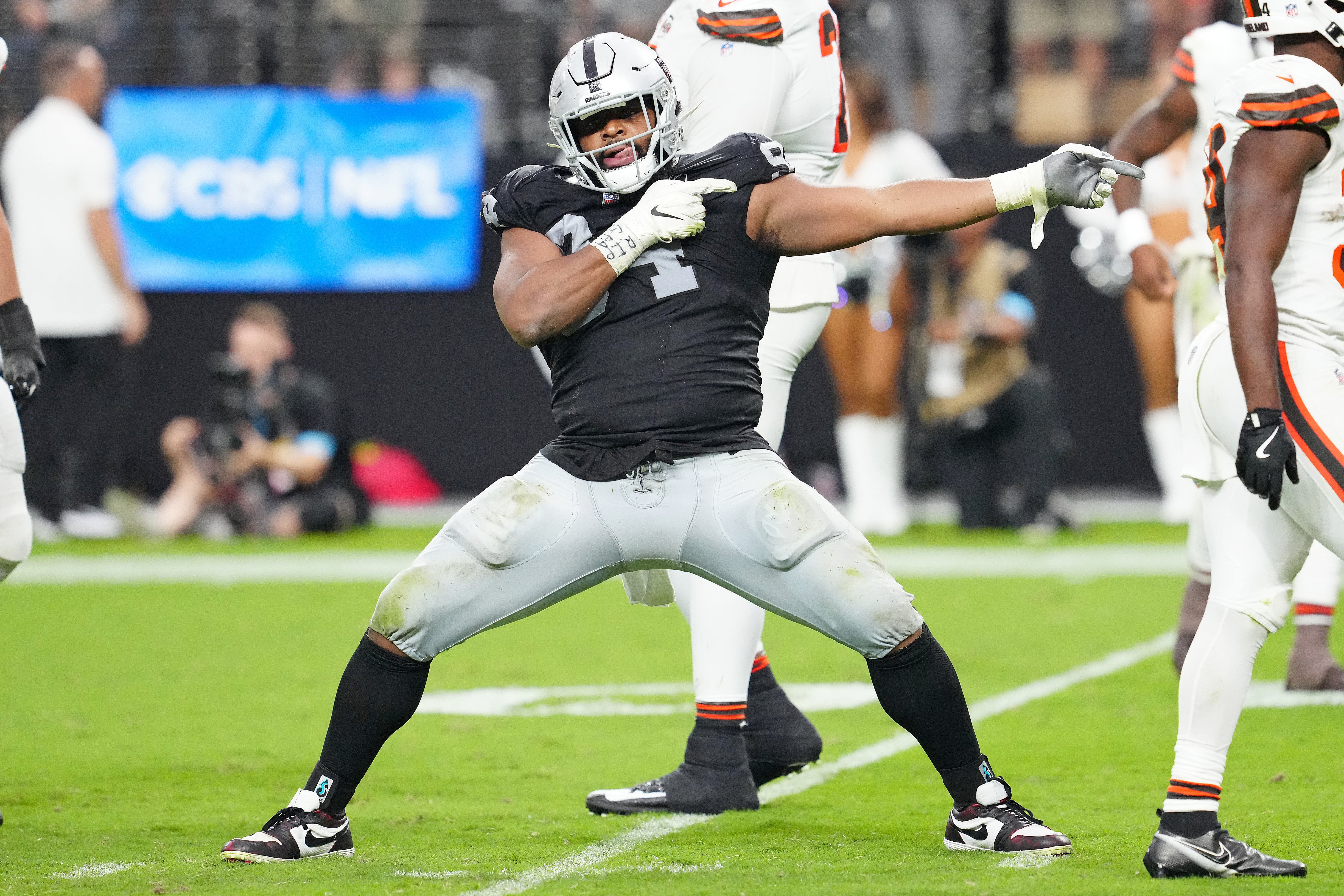 Las Vegas Raiders defensive tackle Christian Wilkins (94) celebrates after a penalty overturned a scoring play by the Cleveland Browns during the fourth quarter at Allegiant Stadium. 