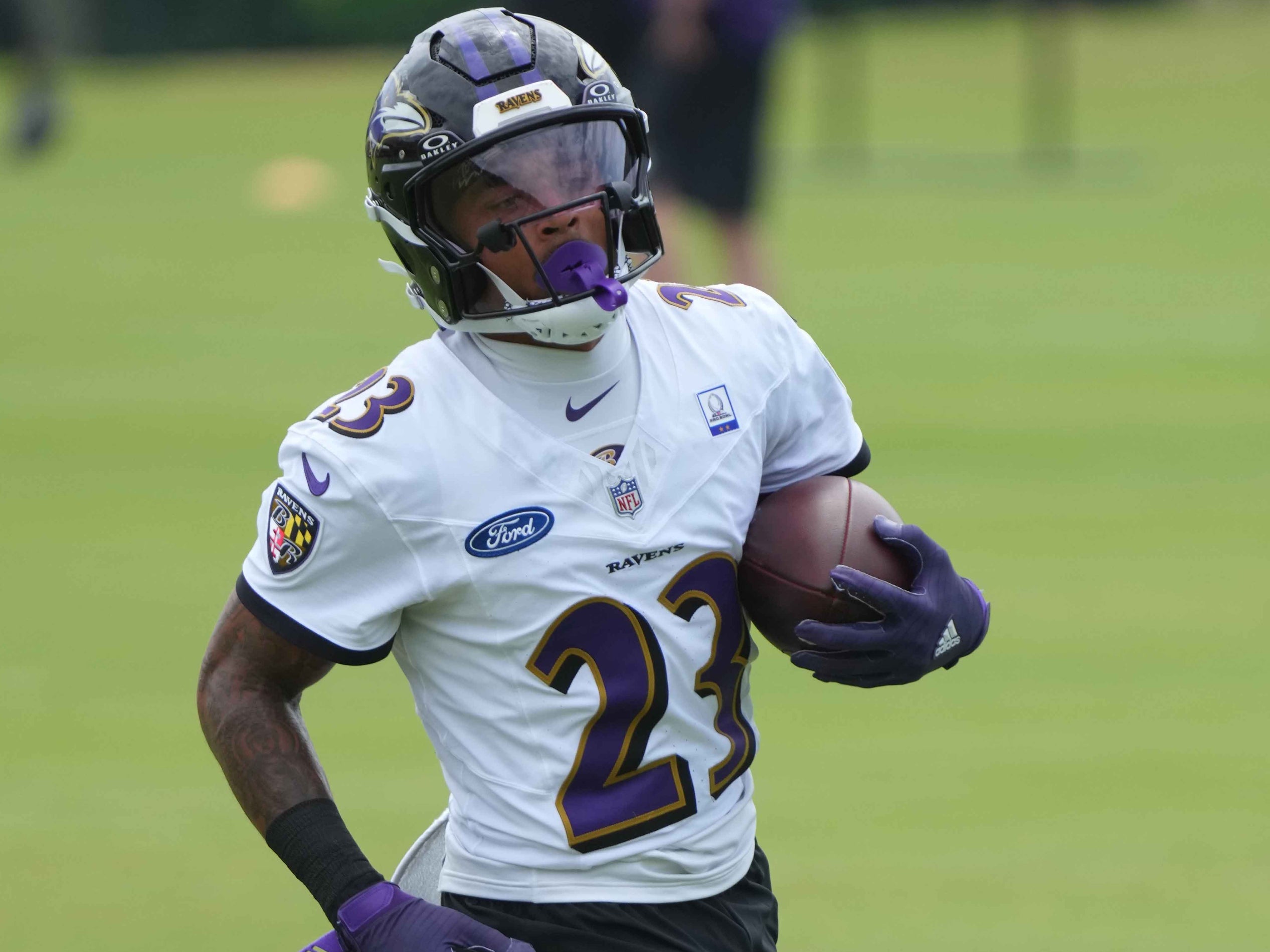 Baltimore Ravens cornerback Jaire Alexander (23) runs drills during training camp at the Under Armour Performance Center.