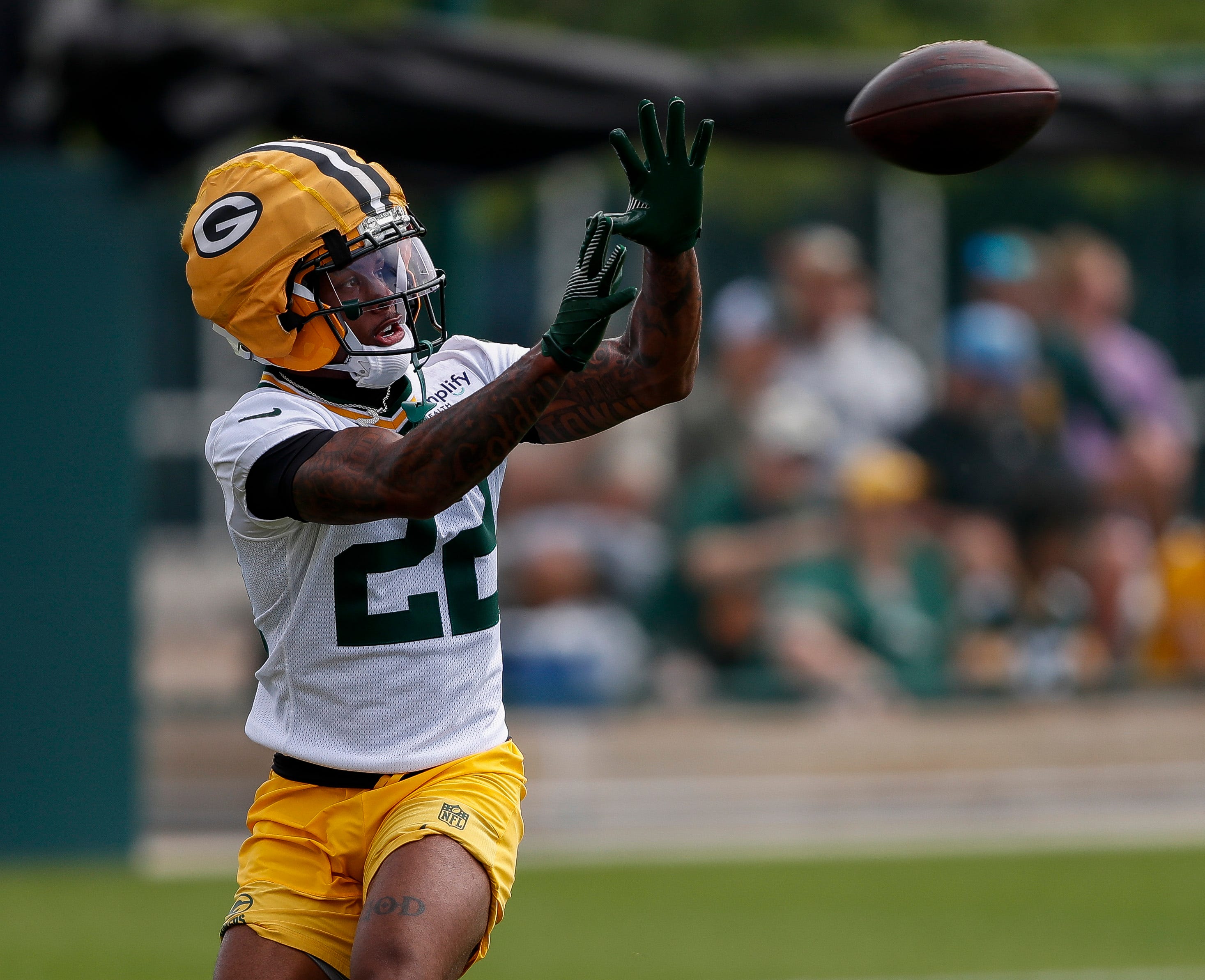 Green Bay Packers wide receiver Matthew Golden (22) catches a pass during the first day of training camp on Wednesday, July 23, 2025, at Ray Nitschke Field in Ashwaubenon, Wis.