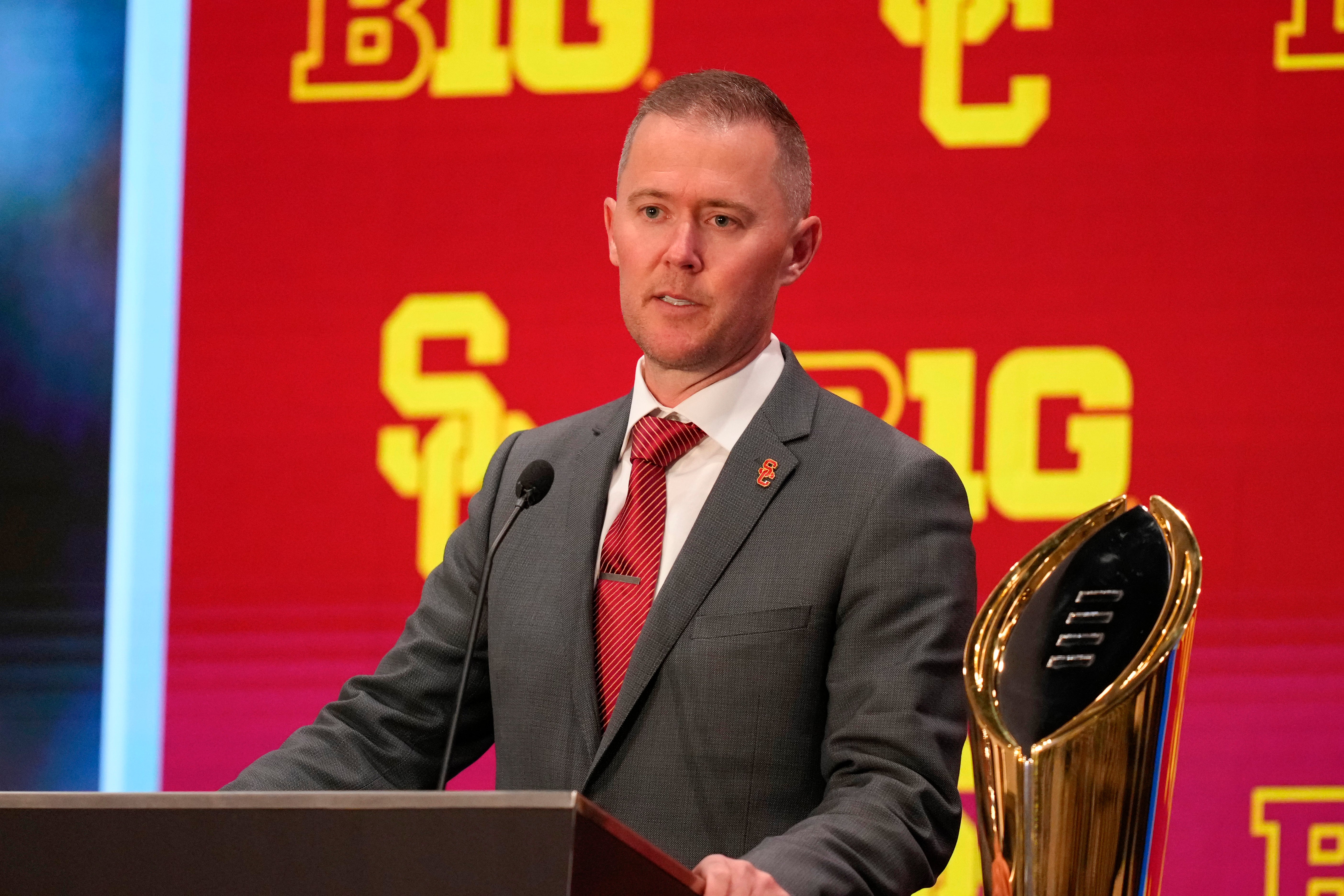 Jul 24, 2025; Las Vegas, NV, USA; USC head coach Lincoln Riley speaks to the media during the Big Ten NCAA college football media days at Mandalay Bay Resort. Mandatory Credit: Lucas Peltier-Imagn Images