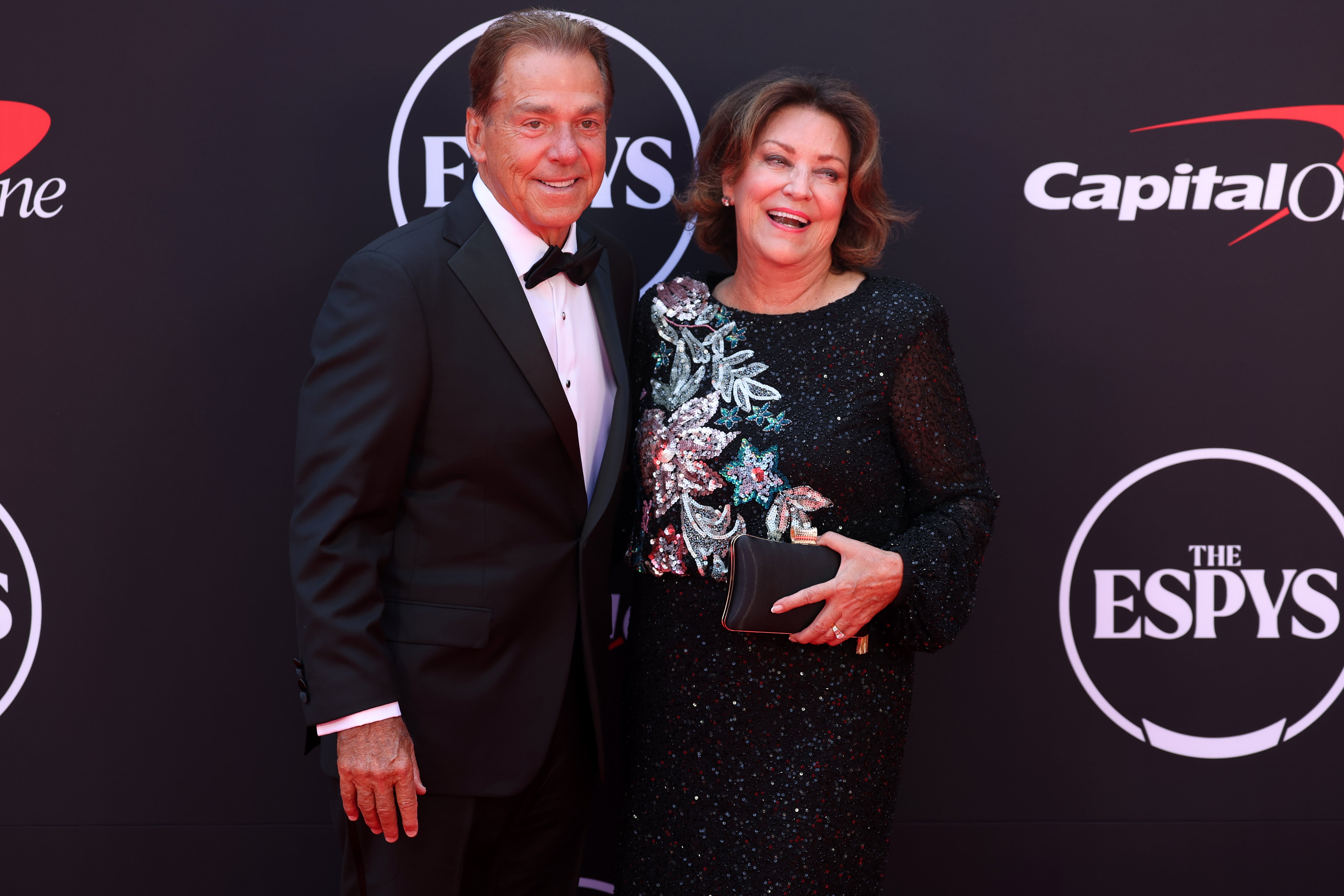 Jul 11, 2024; Los Angeles, CA, USA; Former Alabama head football coach Nick Saban and his wife Terry Saban arrive on the red carpet before the 2024 ESPYS at Dolby Theatre. Mandatory Credit: Kiyoshi Mio-Imagn Images