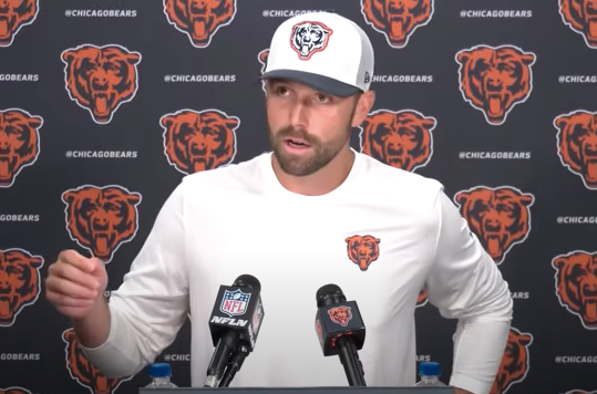 Declan Doyle speaks with reporters after a training camp practice.