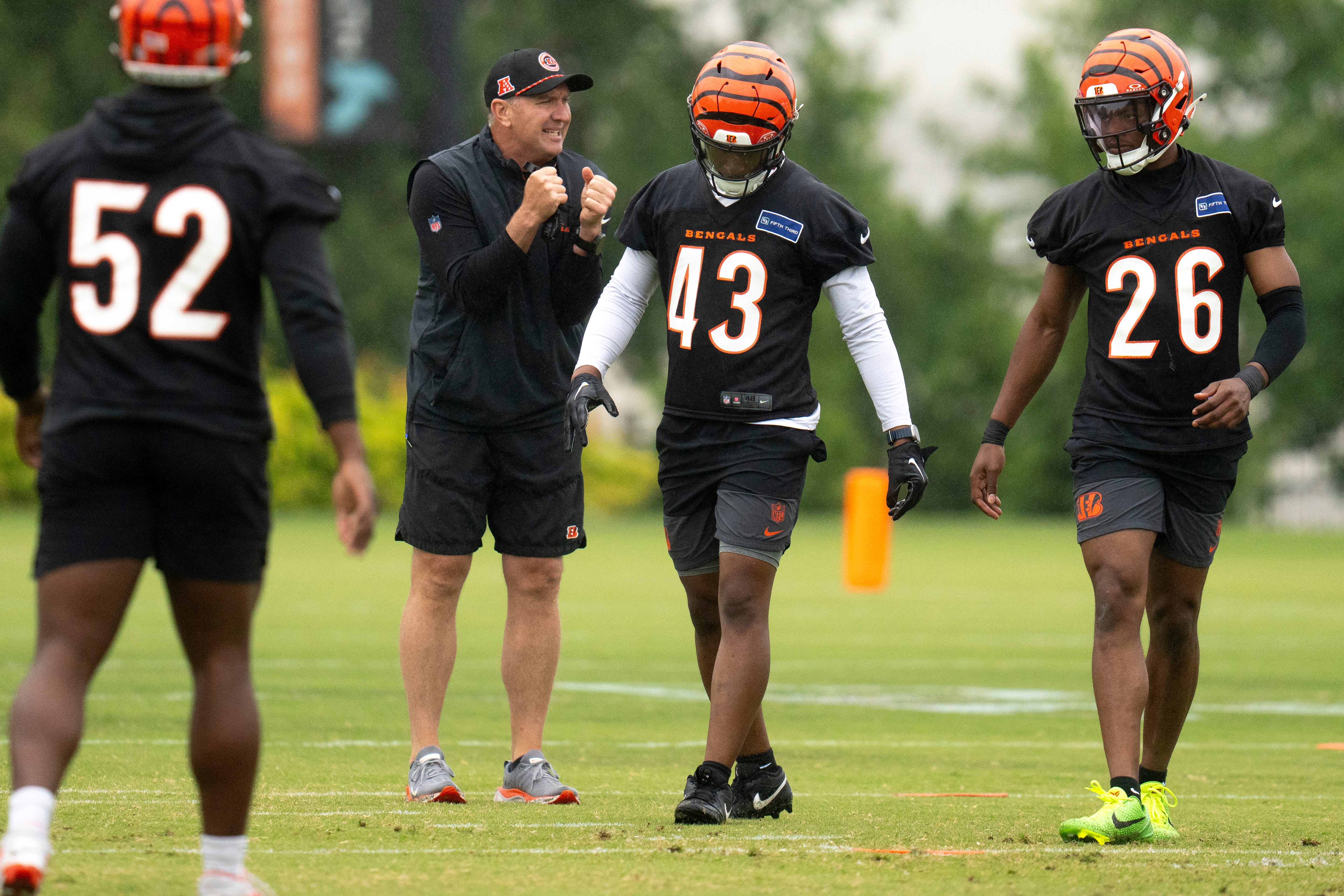 Cincinnati Bengals special teams coordinator Darrin Simmons coaches Cincinnati Bengals safety Jaylen Key (43) and Cincinnati Bengals safety Tycen Anderson (26) during the Cincinnati Bengals practice in Cincinnati on Tuesday, May 27, 2025.