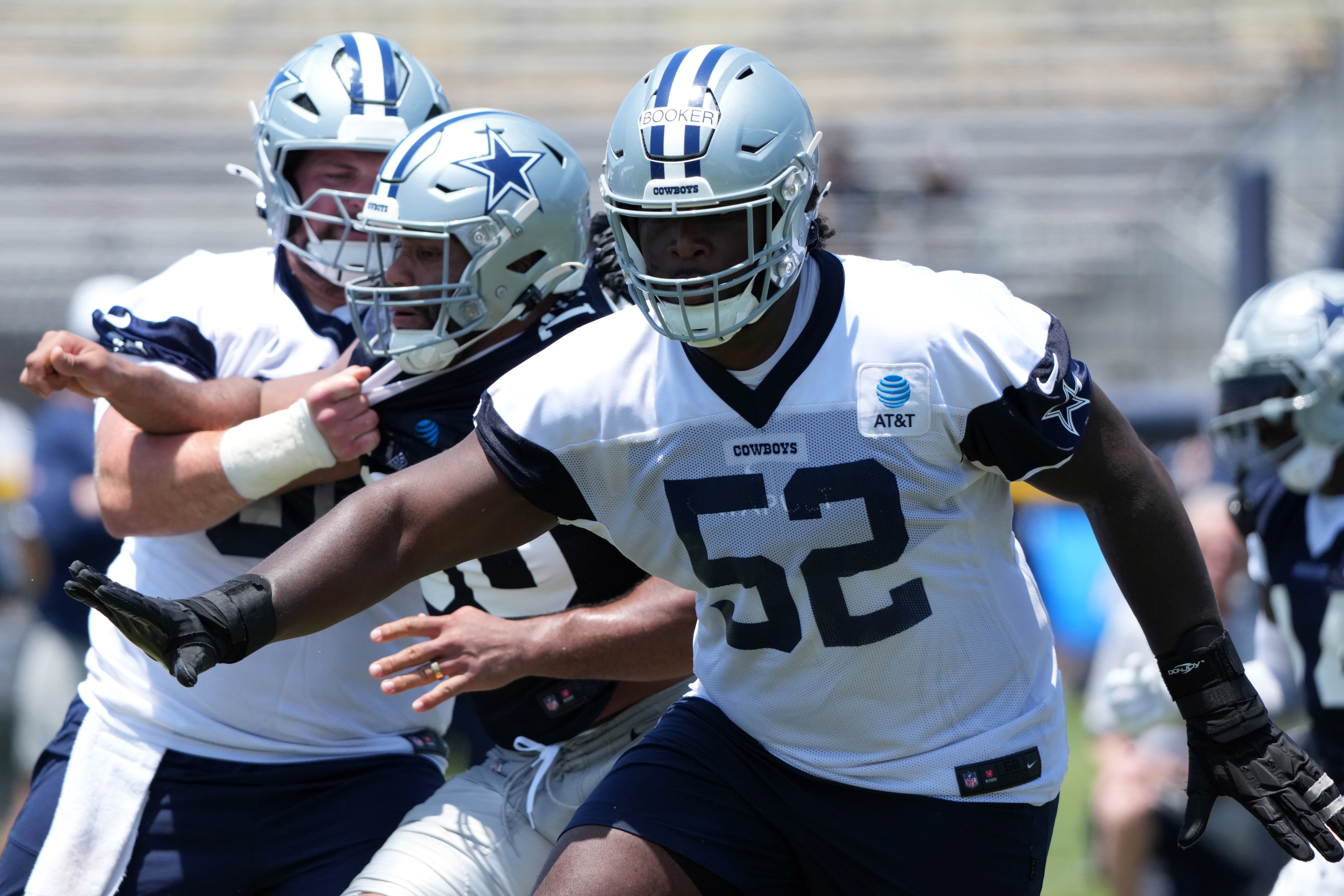 Dallas Cowboys guard Tyler Booker (52) during training camp at the River Ridge Fields.