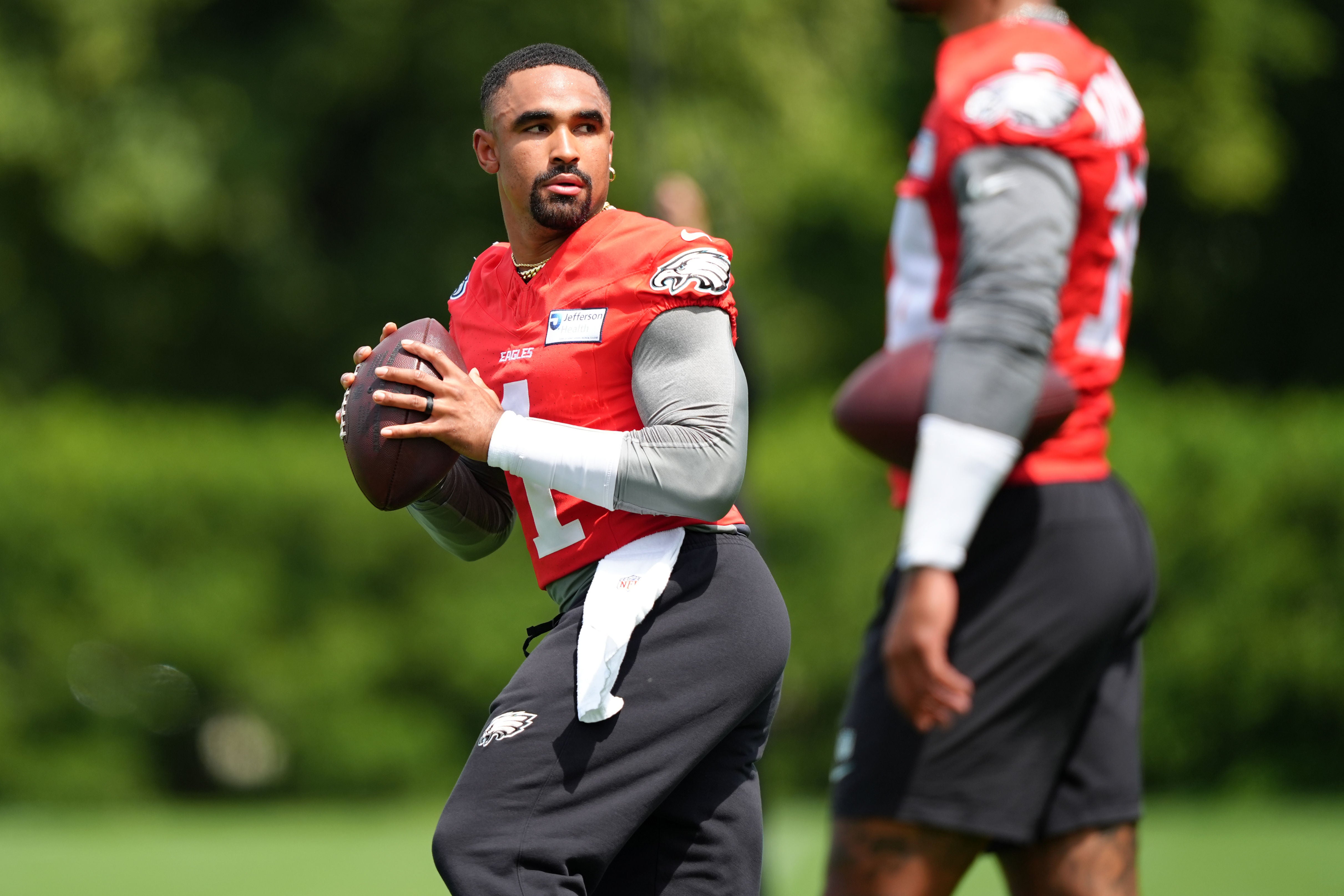 Philadelphia Eagles quarterback Jalen Hurts (1) performs a practice drill at NovaCare Complex.