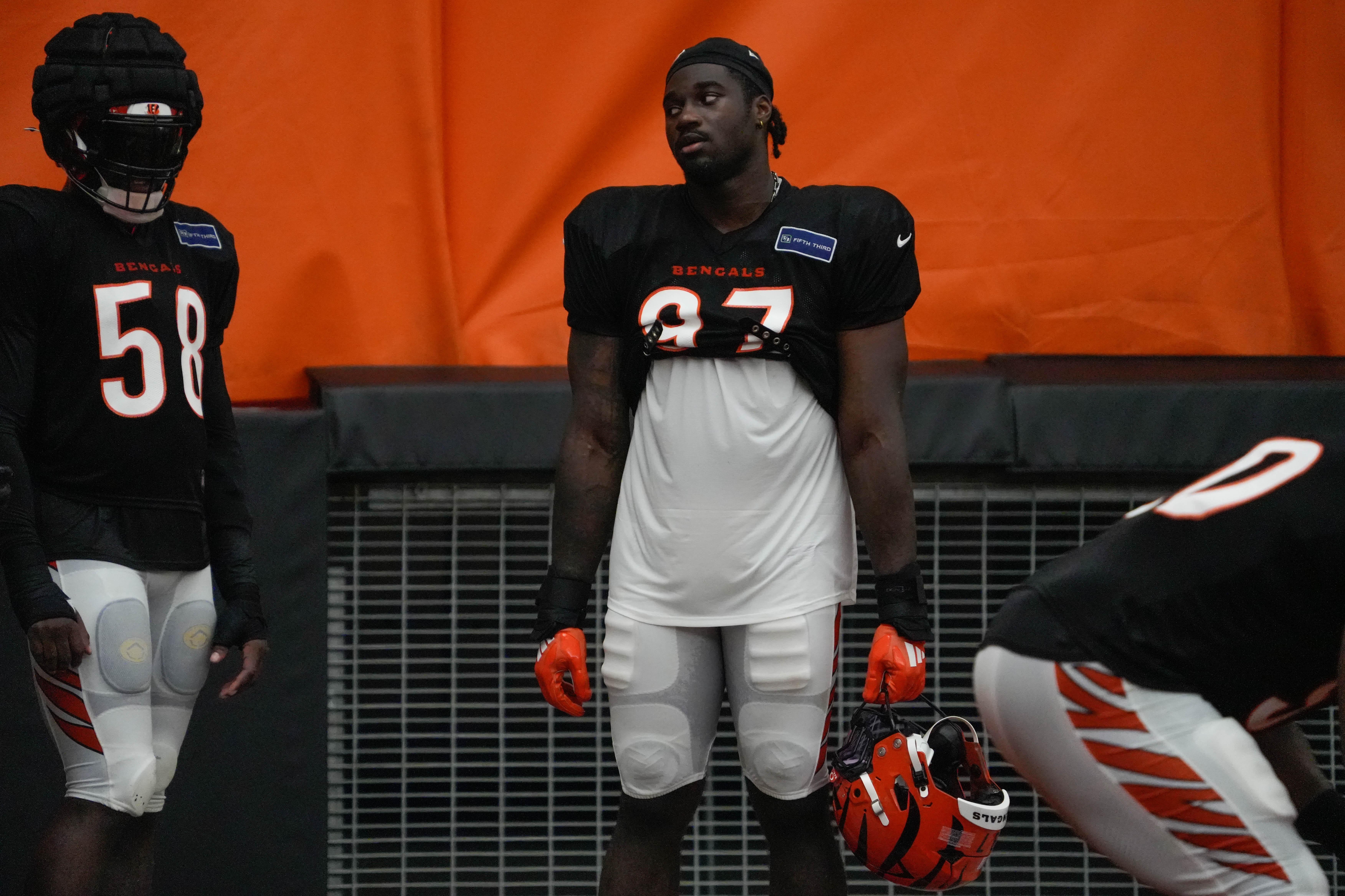 Bengals continue training camp Monday July 28, 2025. Players and coaches ran drills outside on the practice lawn until rain moved the camp to the Bengals' inside practice facility. Bengals Shemar Stewart (97) at camp.