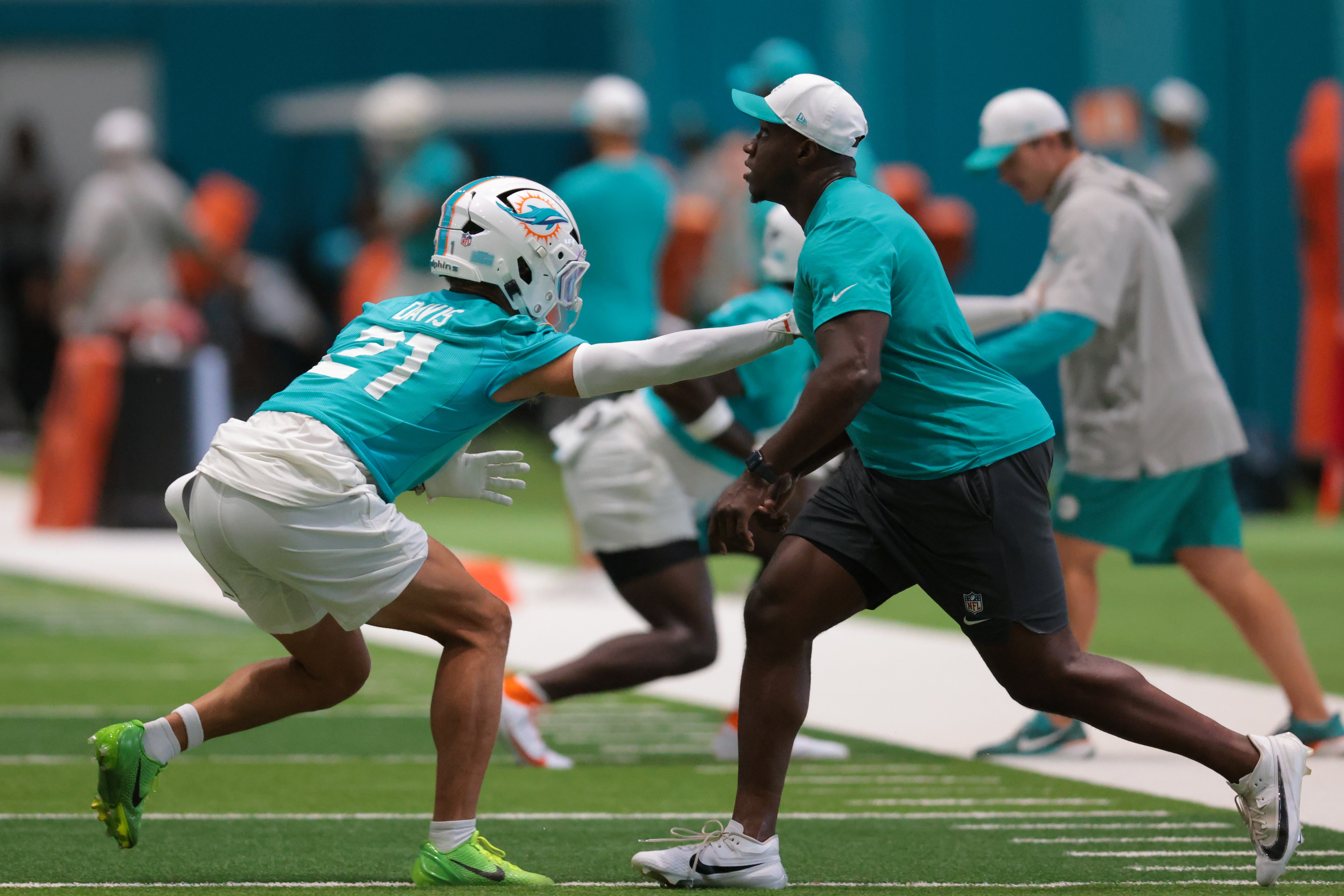 Jul 23, 2025; Miami Gardens, FL, USA; Miami Dolphins safety Ashtyn Davis (21) works during training camp at Baptist Health Training Complex.