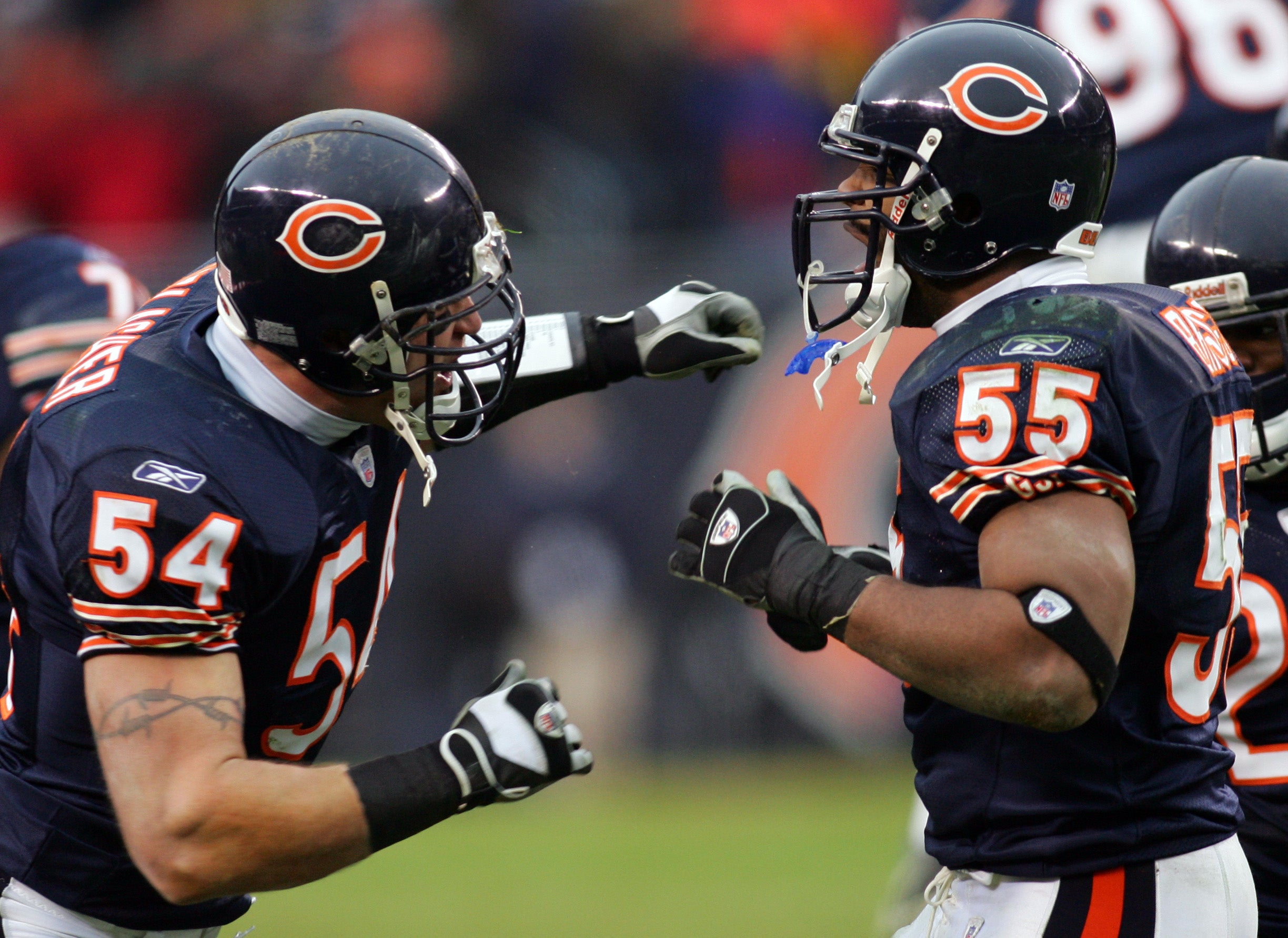 Jan 14, 2007; Chicago, IL, USA; Chicago Bears linebacker (55) Lance Briggs celebrates with (54) Brian Urlacher after stopping the Seattle Seahawks on a fourth-and-one play during the 4th quarter of the NFC Divisional Playoff game at Soldier Field in Chicago, IL. Chicago defeated beat the Seahawks 27-24 in overtime.