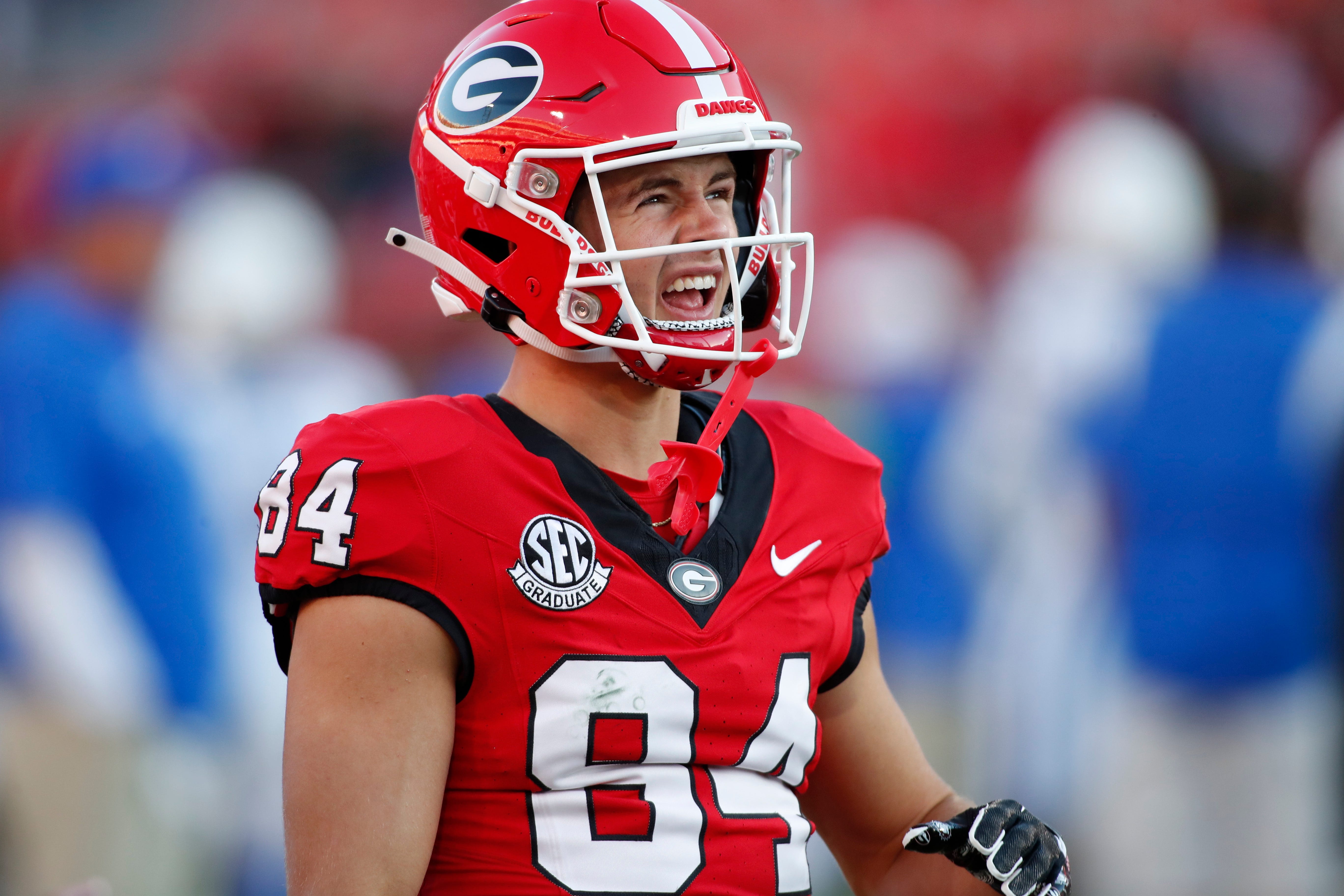 Georgia wide receiver Ladd McConkey (84) wraps up for his first game back in Sanford Stadium after returning from an injury before the start of a NCAA college football game against Kentucky in Athens.