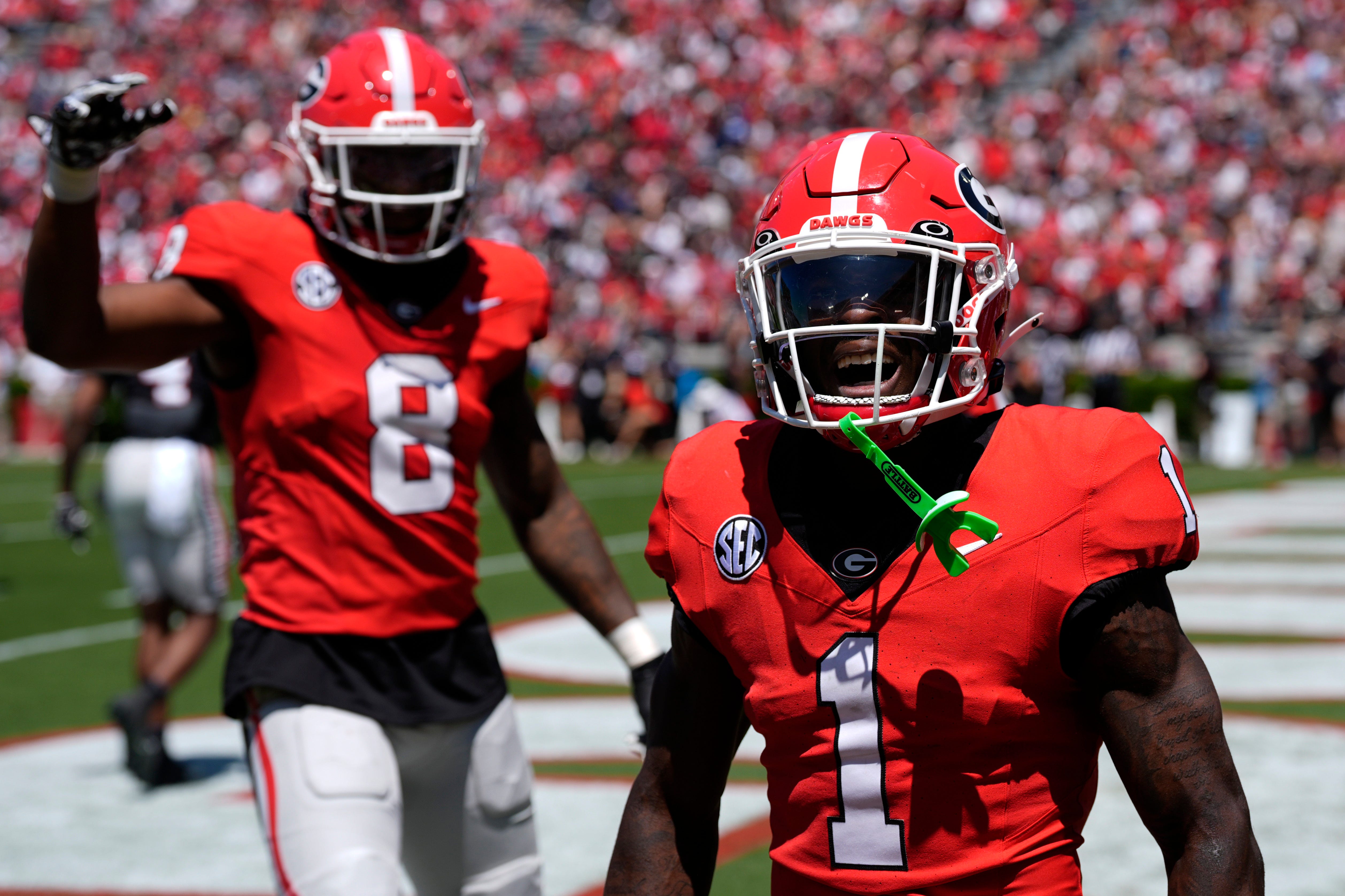Georgia wide receiver Zachariah Branch (1) celebrates after pulling in a deep pass for a big gain during the Georgia G-Day spring football game in Athens, Ga., on Saturday, April 12, 2025.