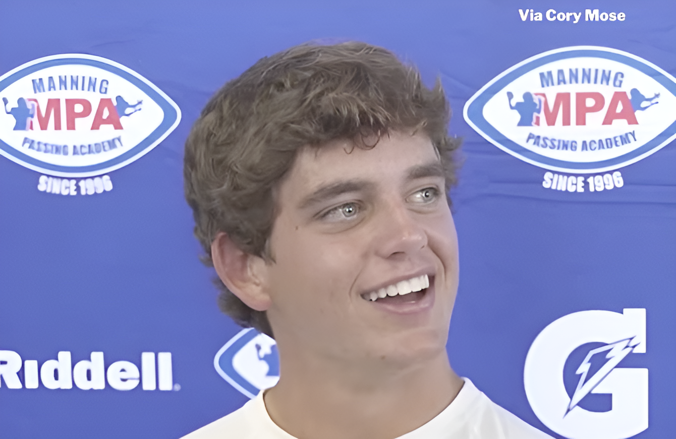 Texas Longhorns QB Arch Manning answers questions from reporters at the Manning Passing Academy.