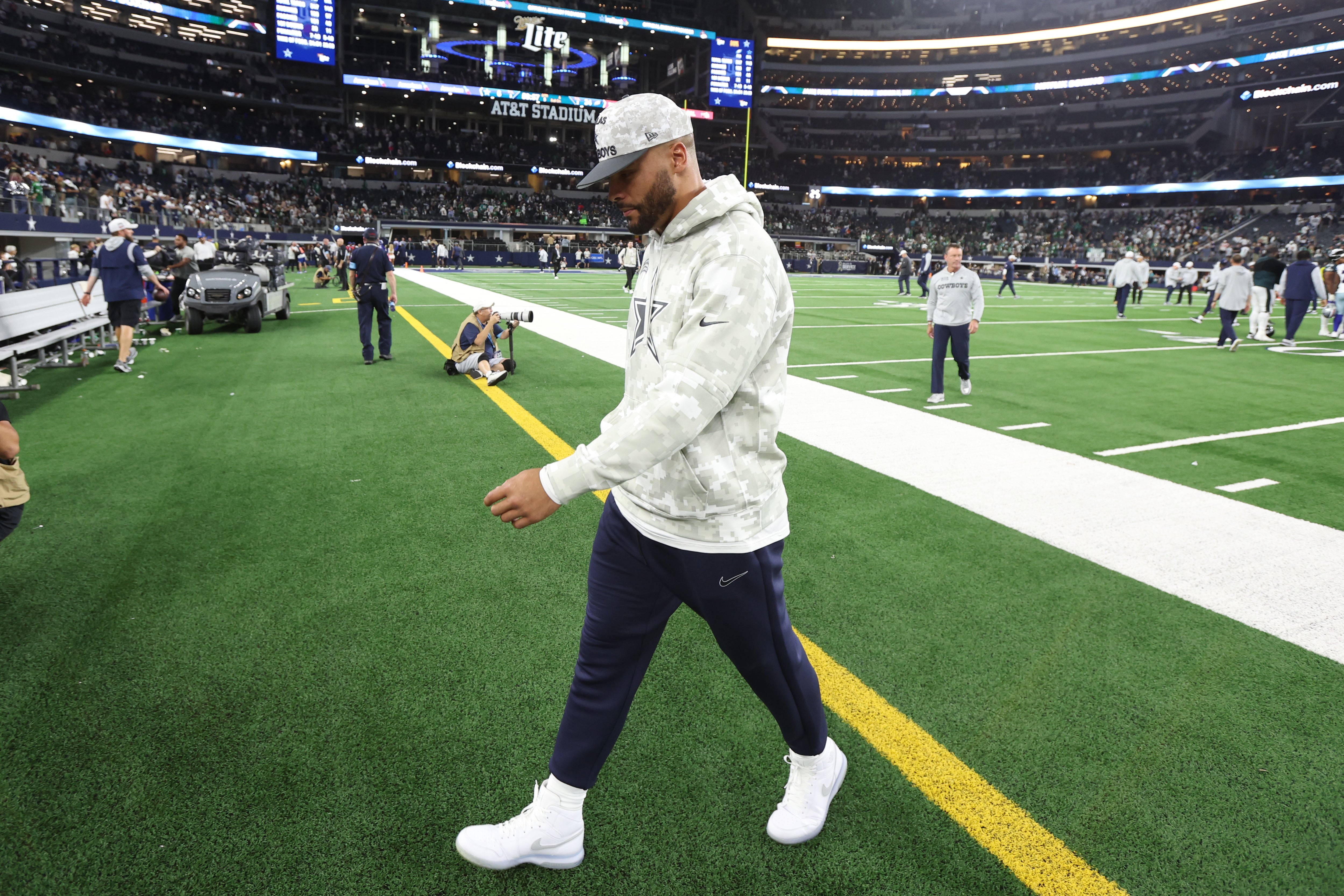 Dallas Cowboys quarterback Dak Prescott (4) walks off the field after the game against the Philadelphia Eagles at AT&T Stadium.